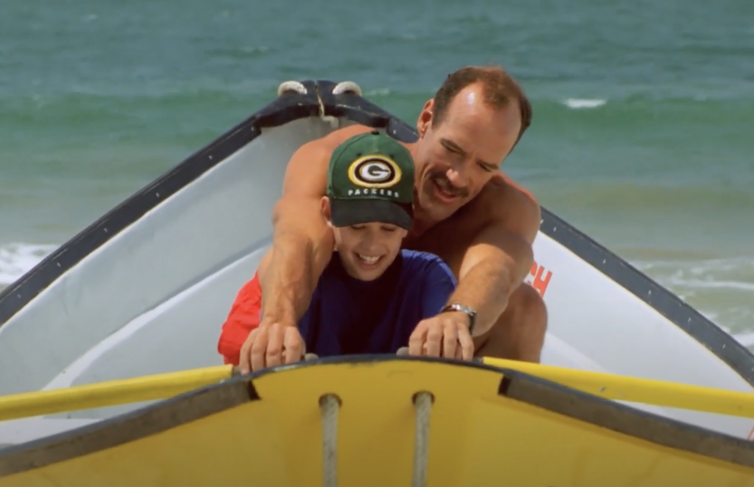 Michael Newman and a child actor on the set of "Baywatch" | Source: YouTube/Baywatch