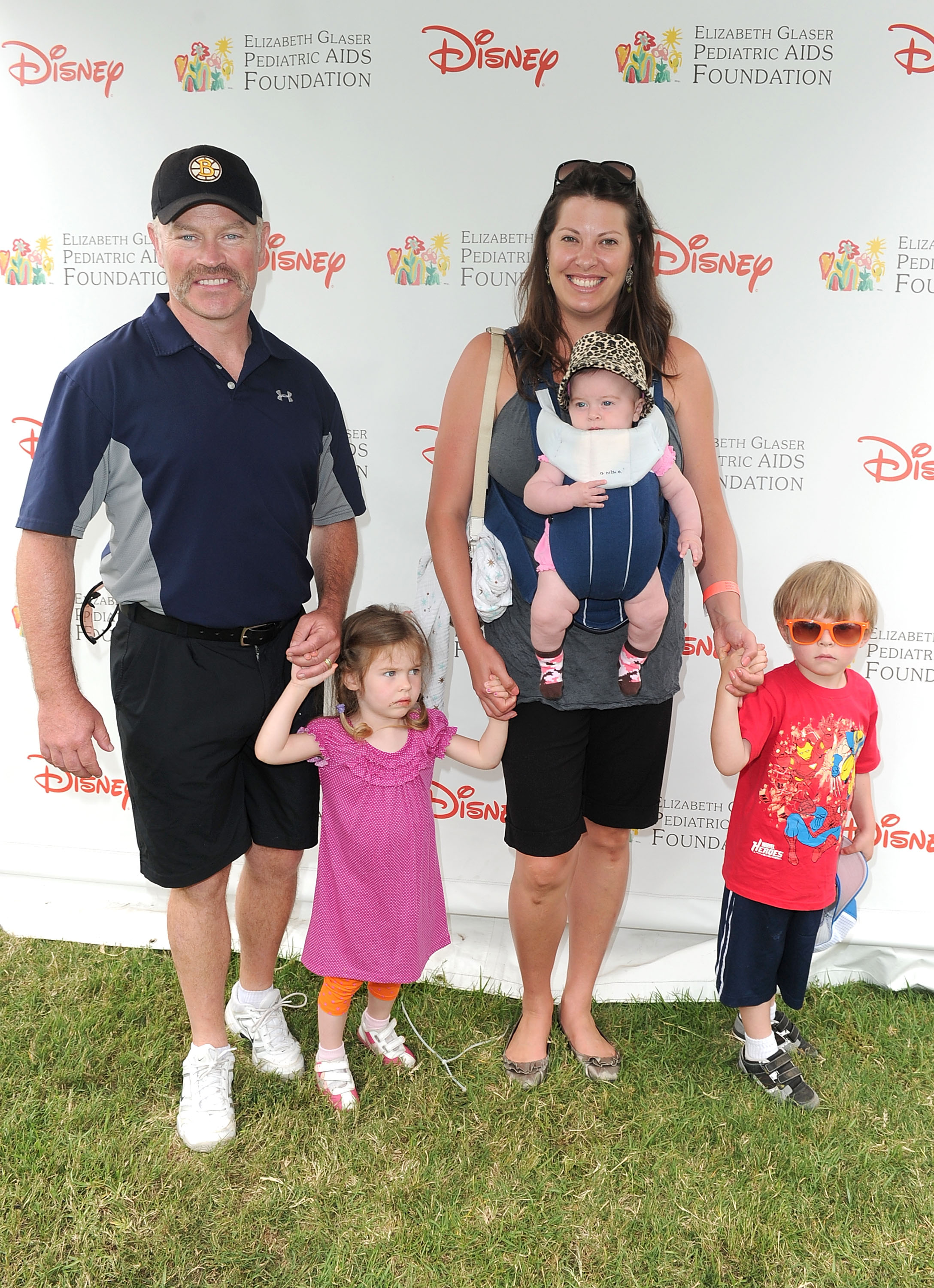 Neal McDonough (L) and wife Ruve (2nd from R) with kids arrive at the 21st A Time For Heroes Celebrity Picnic sponsored by Disney to benefit the Elizabeth Glaser Pediatric Aids Foundation held at Wadsworth Great Lawn on June 13, 2010 in Los Angeles, California. | Source: Getty Images