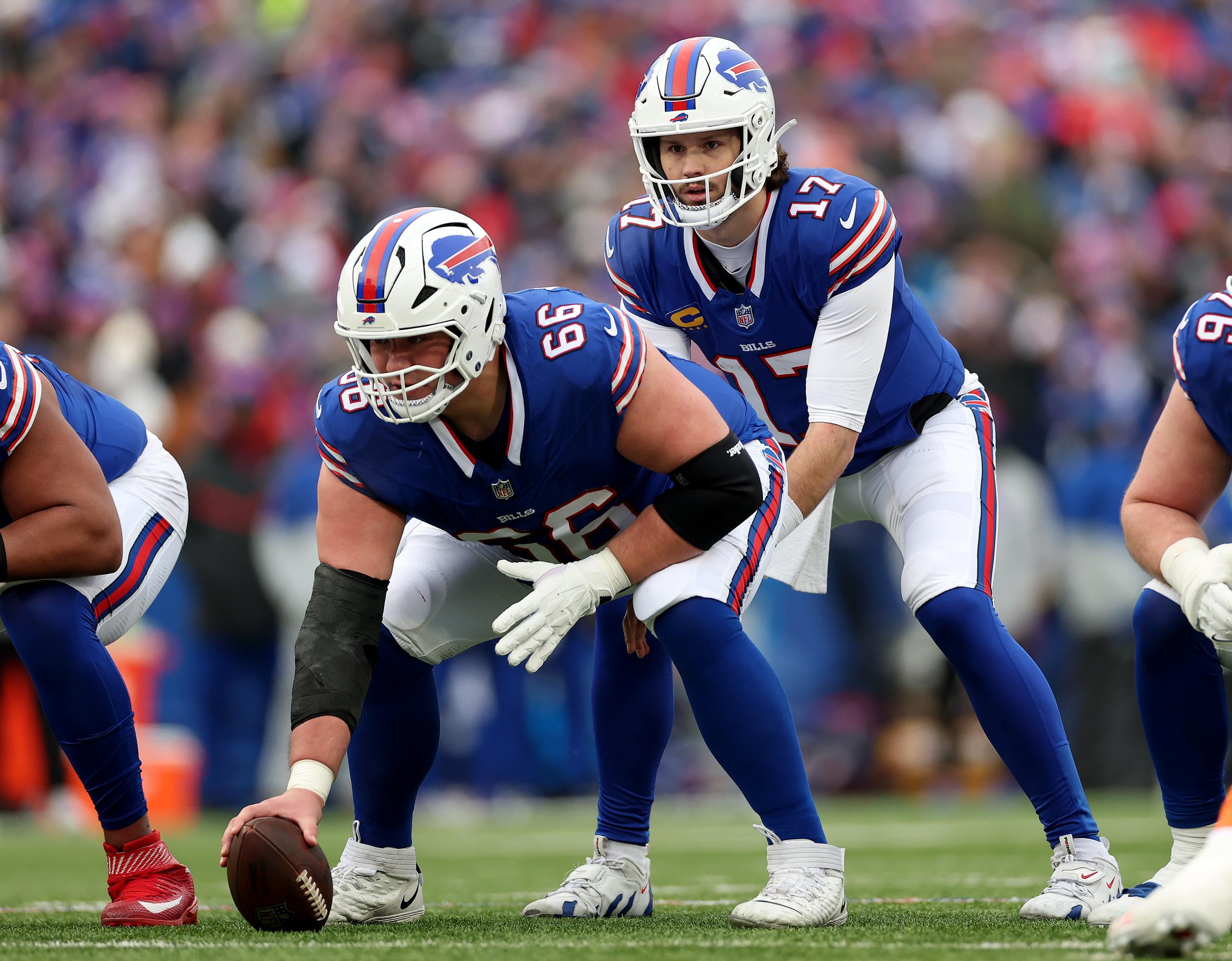 Josh Allen and fellow Buffalo Bills player Connor McGovern during the game against the Denver Broncos. | Source: Getty Images