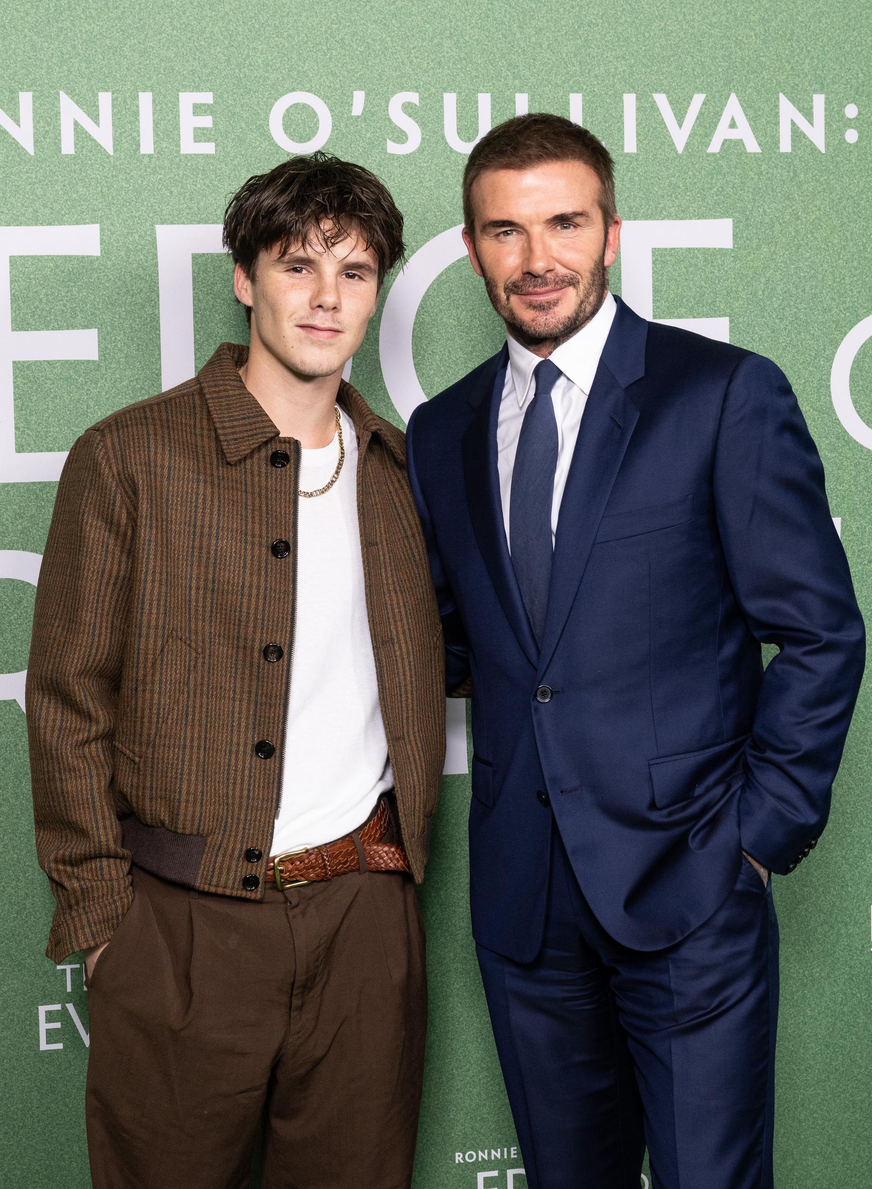 Cruz and Sir David Beckham at the "Ronnie O'Sullivan: The Edge of Everything" premiere on November 21, 2023, in London, England. | Source: Getty Images