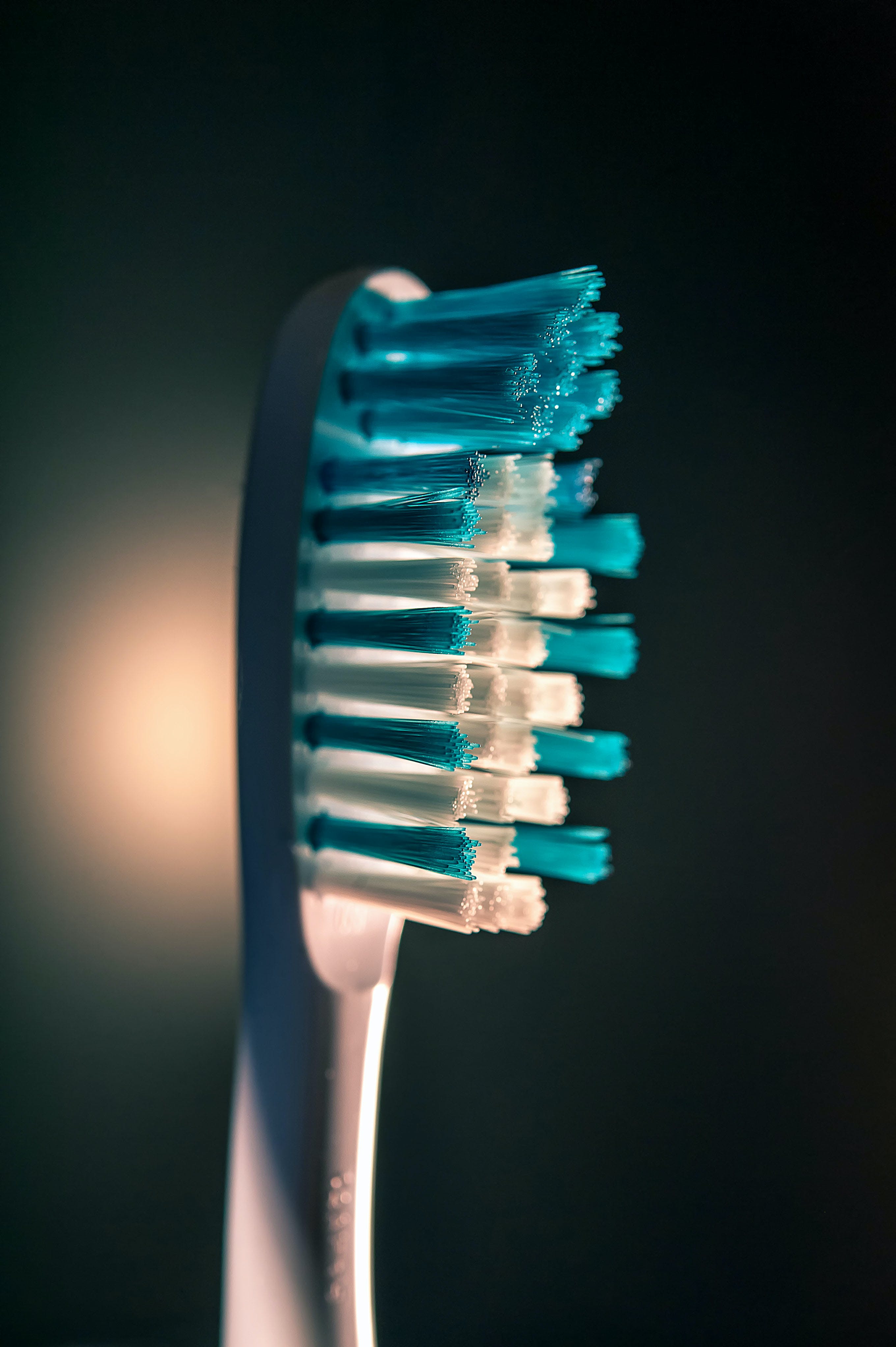 A closeup photo of a toothbrush. | Source: Pexels