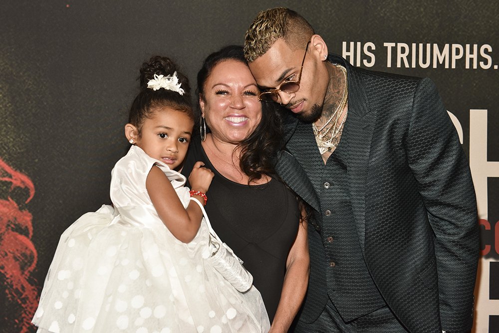 Chris Brown (R), mother Joyce Hawkins, and daughter Royalty Brown attend the premiere of "Chris Brown: Welcome to My Life" at Regal LA Live Stadium 14 on June 6, 2017 in Los Angeles, California. I Image: Getty Images.