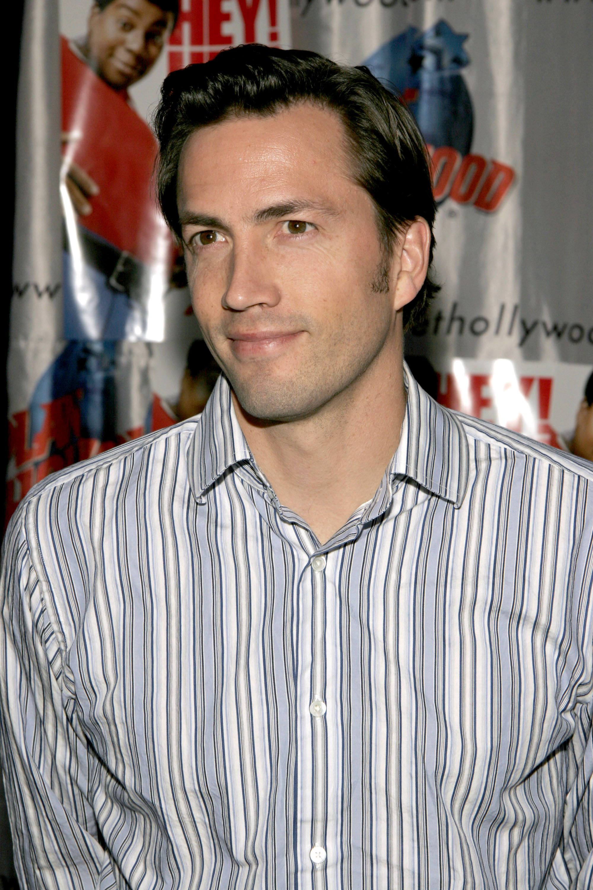 The former actor poses for a photo at Planet Hollywood on December 21, 2004 | Source: Getty Images