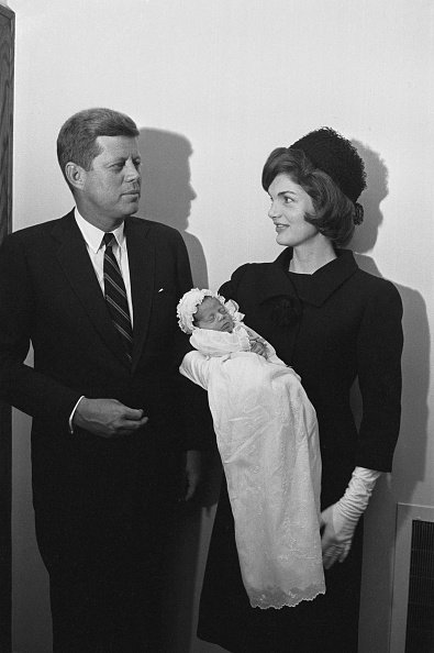 President John F. Kennedy, Jacqueline Kennedy, and John Kennedy Jr. at the Georgetown University Hospital Chapel in Washington, DC. in 1960. | Photo: Getty Images