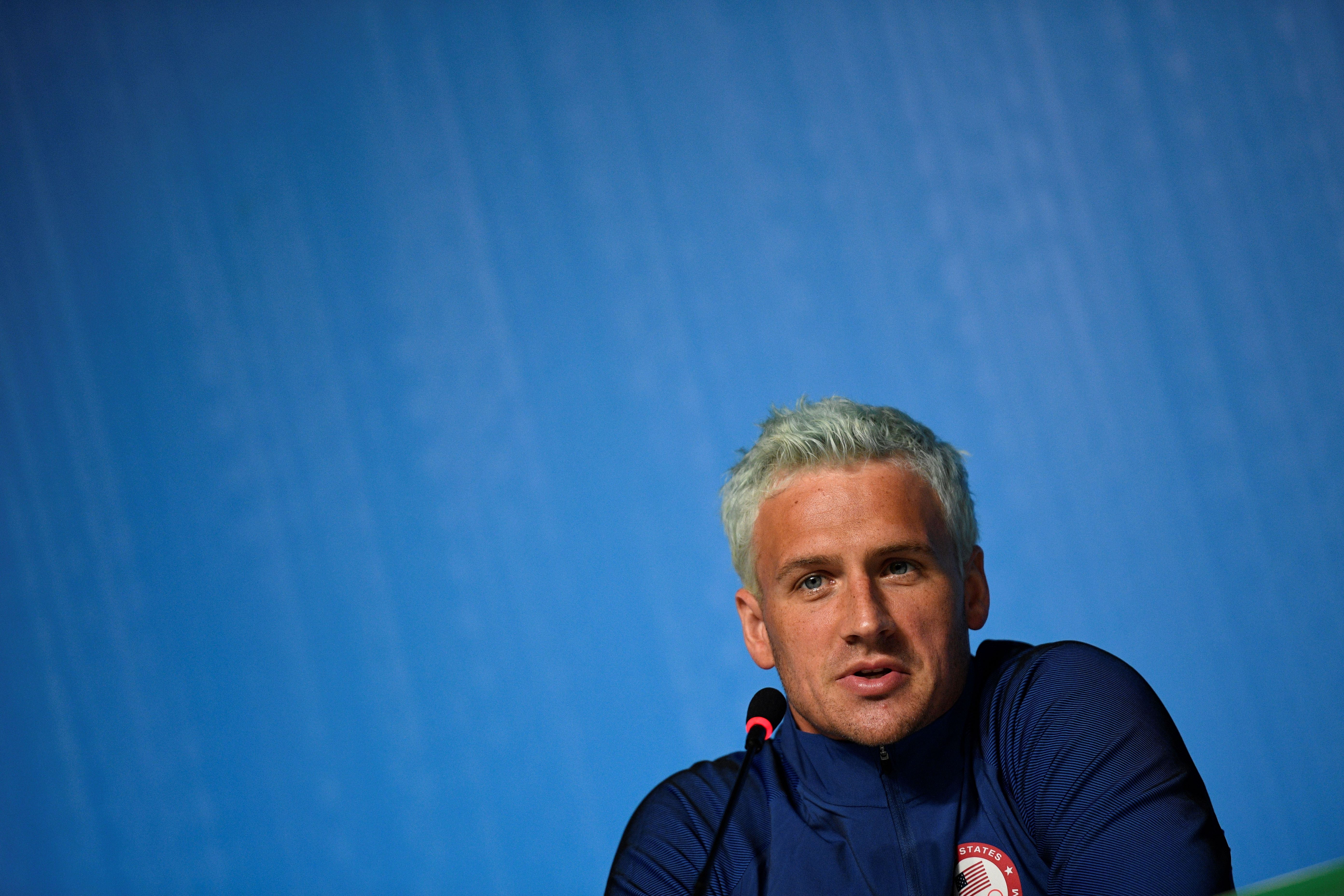 Ryan Lochte holds a press conference two days ahead of the opening ceremony of the Rio 2016 Olympic Games in Rio de Janeiro, on August 3, 2016. | Source: Getty Images