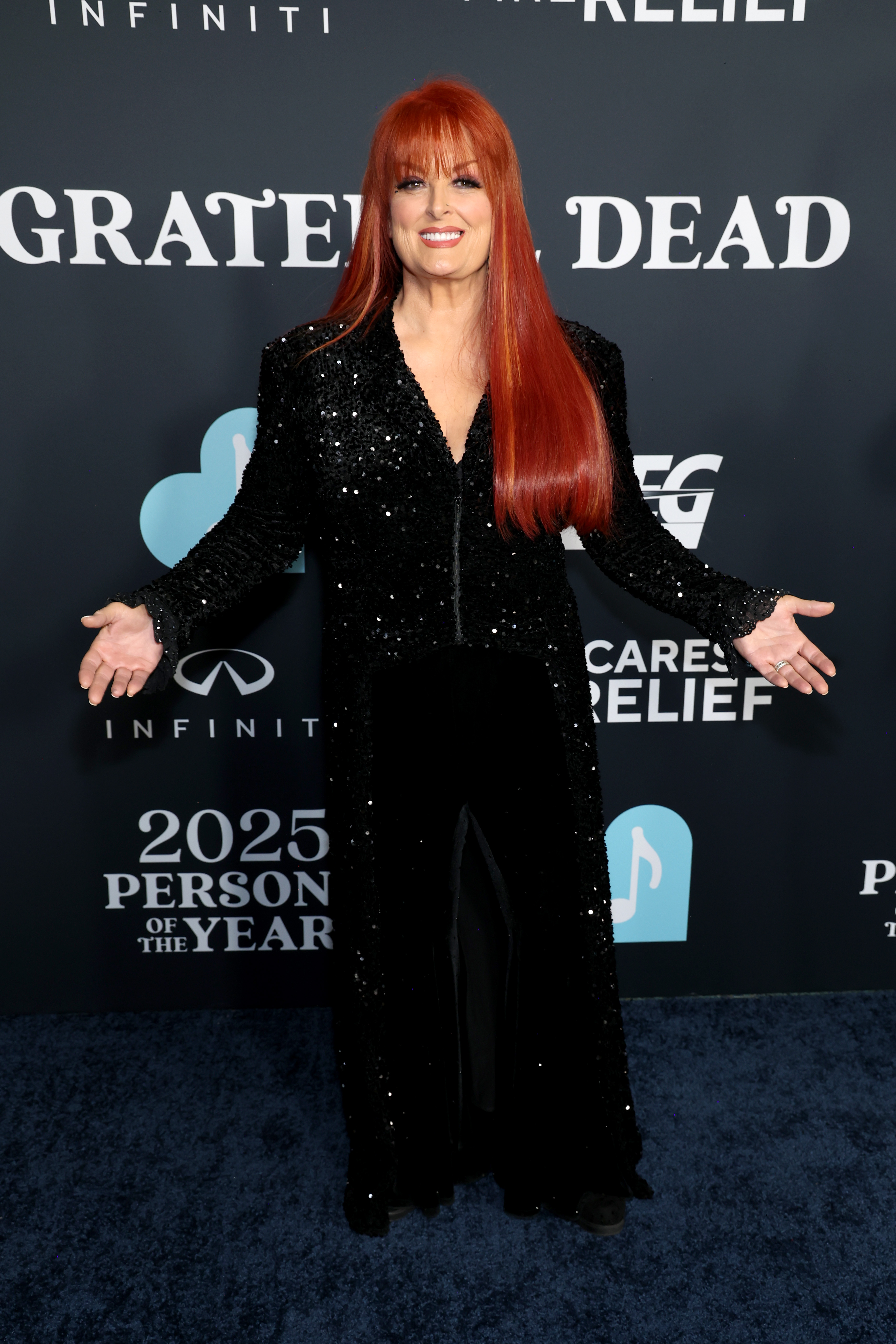 Wynonna Judd posing on the carpet of the MusiCares Persons of the Year Honoring The Grateful Dead event. | Source: Getty Images