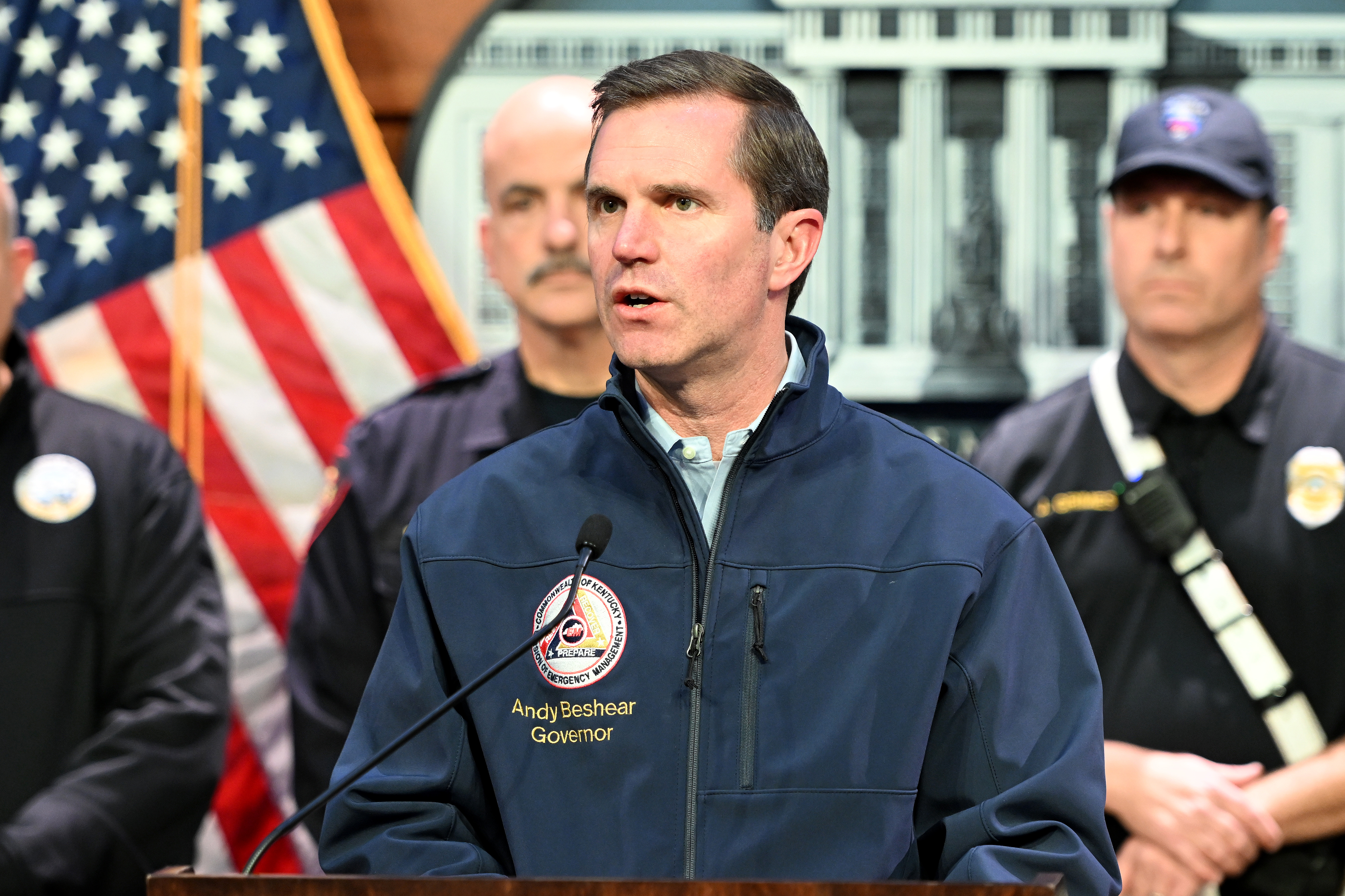 Andy Beshear speaking during the press conference addressing the UPS cargo plane crash in Louisville, Kentucky on November 4, 2025. | Source: Getty Images