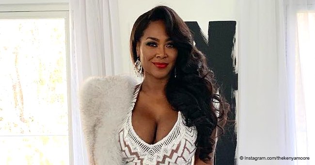 Kenya Moore Shows off Her Slim Post-Partum Figure in Plunging White Dress and High Heels