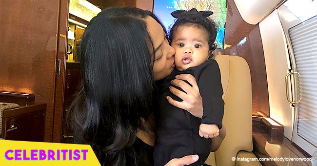 Princess Love's daughter steals hearts in white outfit and bow while playing with her grandma