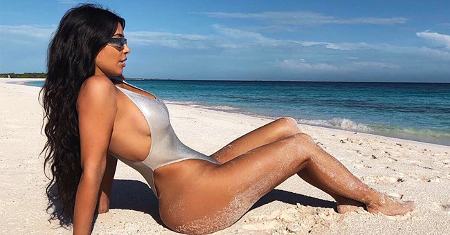 KUWTK Star Kim Kardashian Showcases Iconic Curves in Silver One-Piece  Posing on the Beach