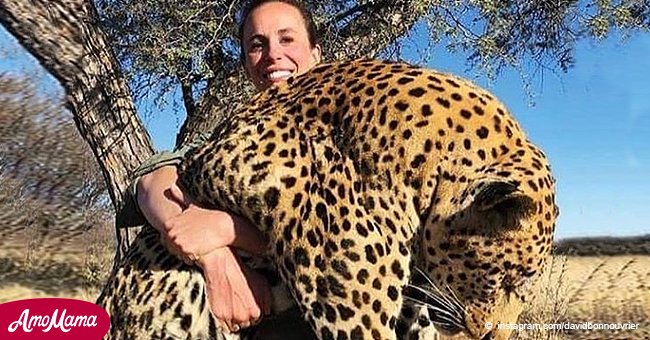 Woman slammed for posing with a dead leopard she killed herself