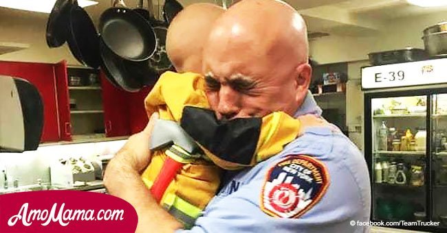 The fireman sees a 3-year-old child running to him. He understands what is happening and his heart is melting