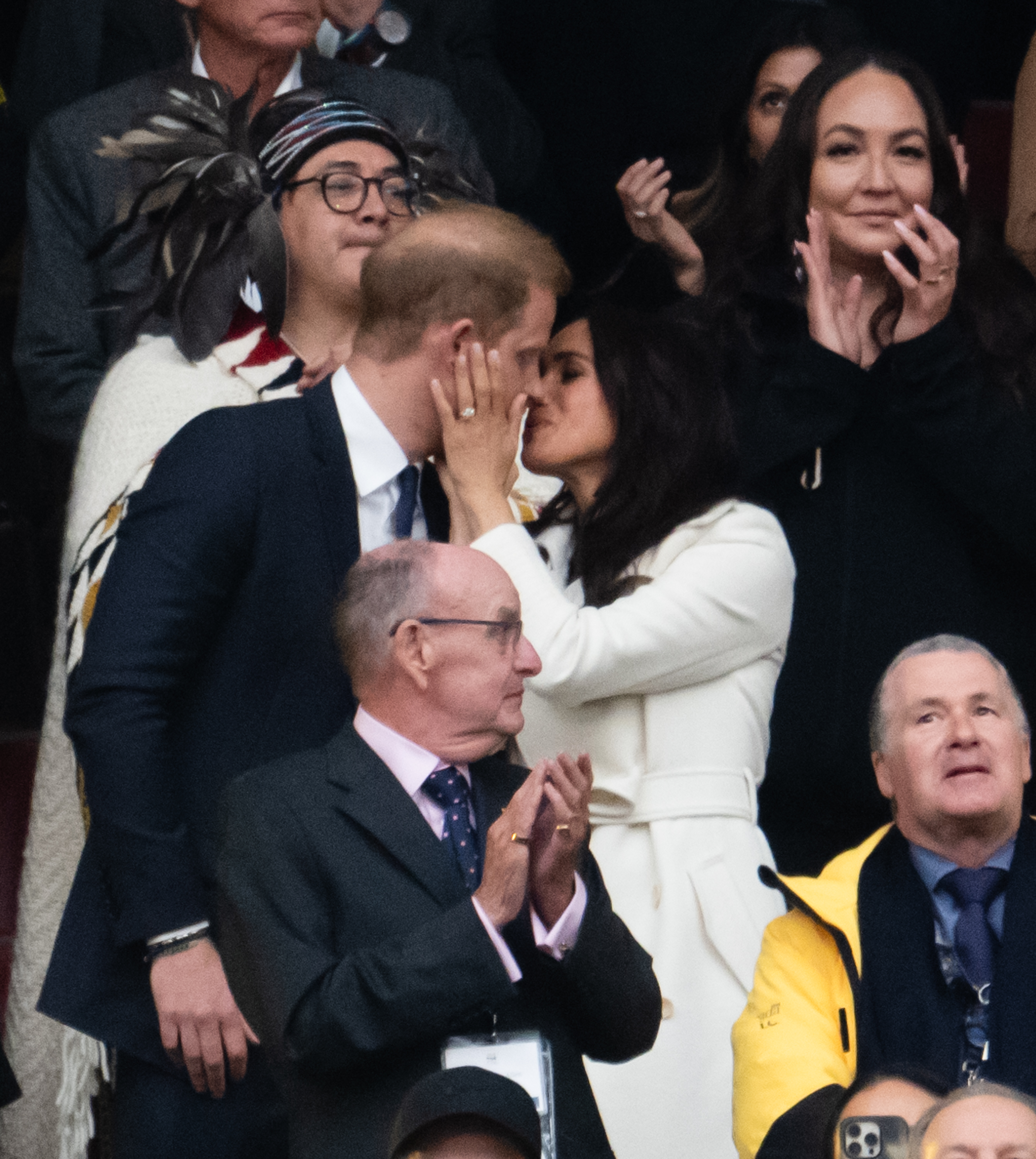 Prince Harry and Meghan, Duchess of Sussex, kissing during the opening ceremony of the 2025 Invictus Games at BC Place on February 8 in Vancouver, British Columbia, Canada. | Source: Getty Images