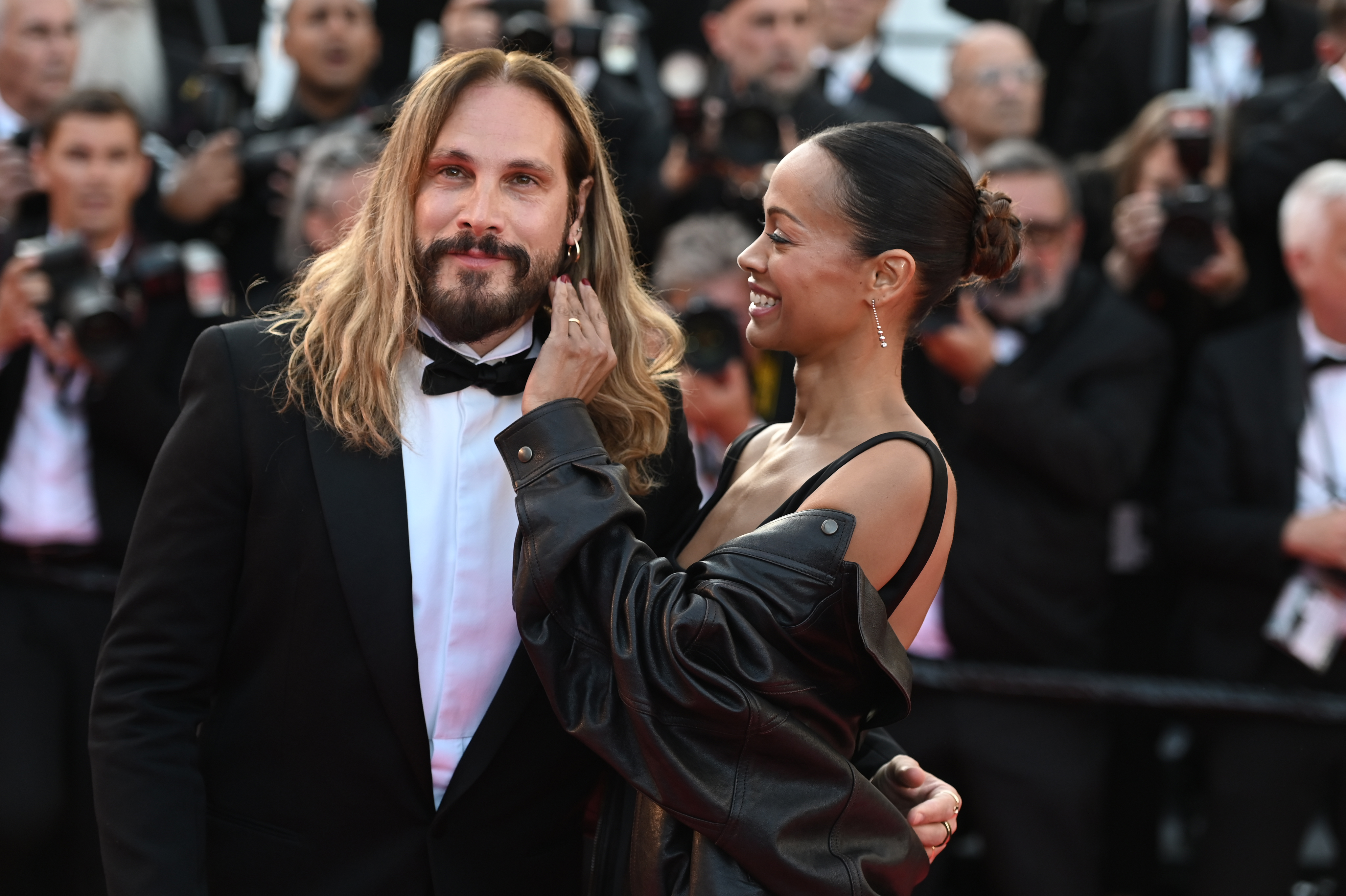 Marco Perego-Saldaña and Zoe Saldaña walk the red carpet at the 78th Cannes International Film Festival on May 14, 2025 | Source: Getty Images