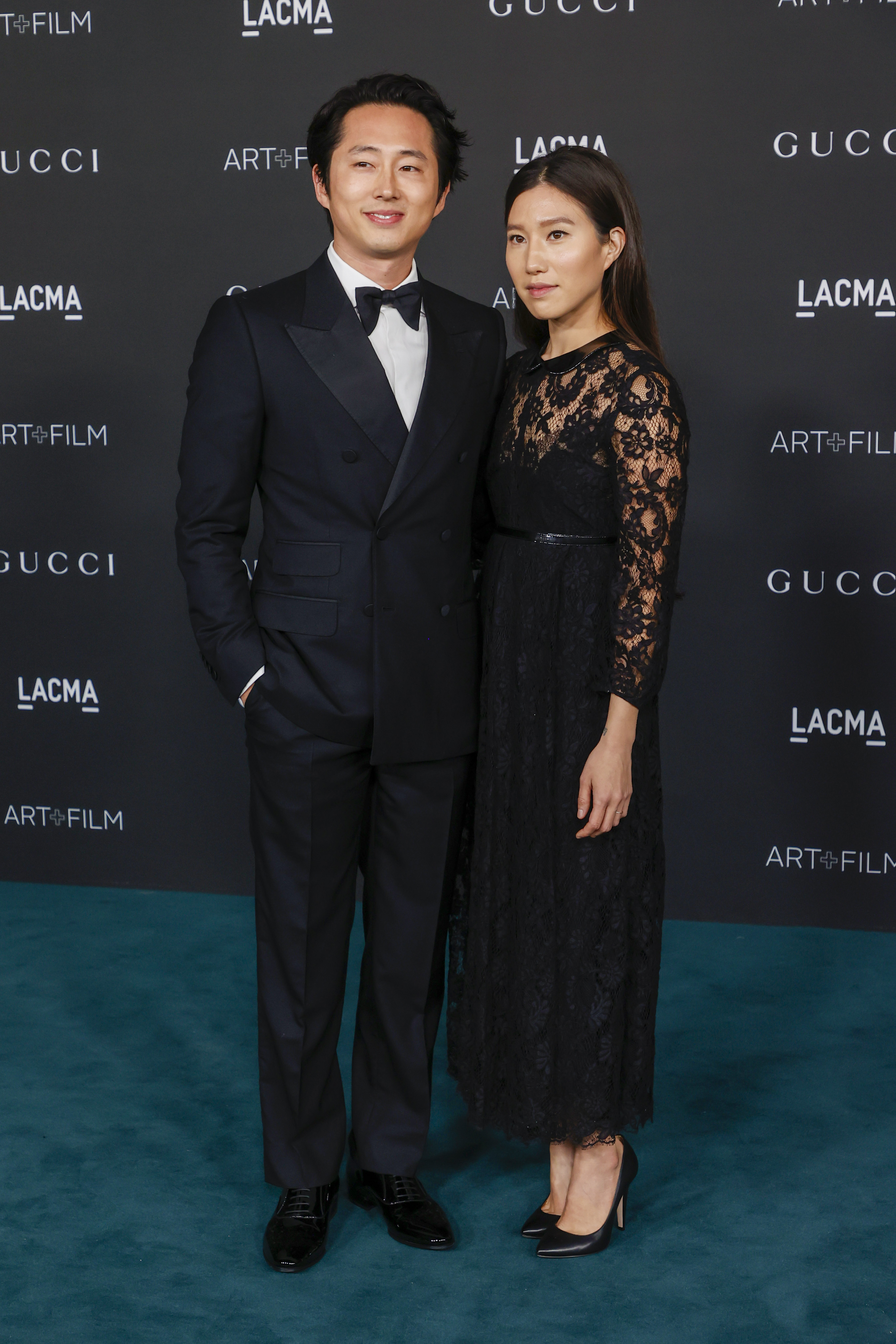 Steven Yeun and Joana Pak pose at the 10th Annual LACMA ART+FILM GALA presented by Gucci at Los Angeles County Museum of Art on November 6, 2021, in Los Angeles, California | Source: Getty Images