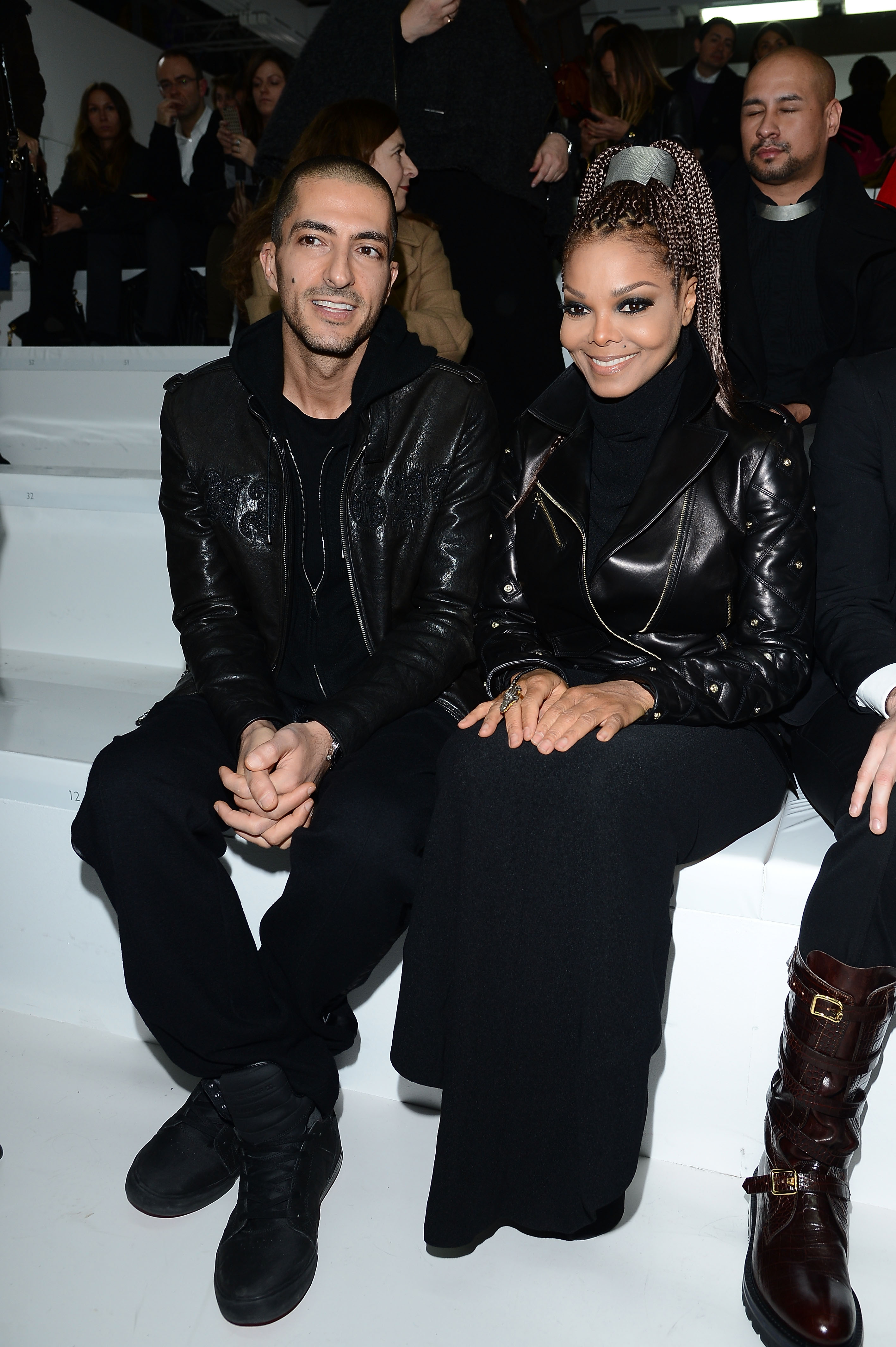 Wissam Al Mana and Janet Jackson attend the Versace fashion show in Milan, Italy, on February 22, 2013. | Source: Getty Images