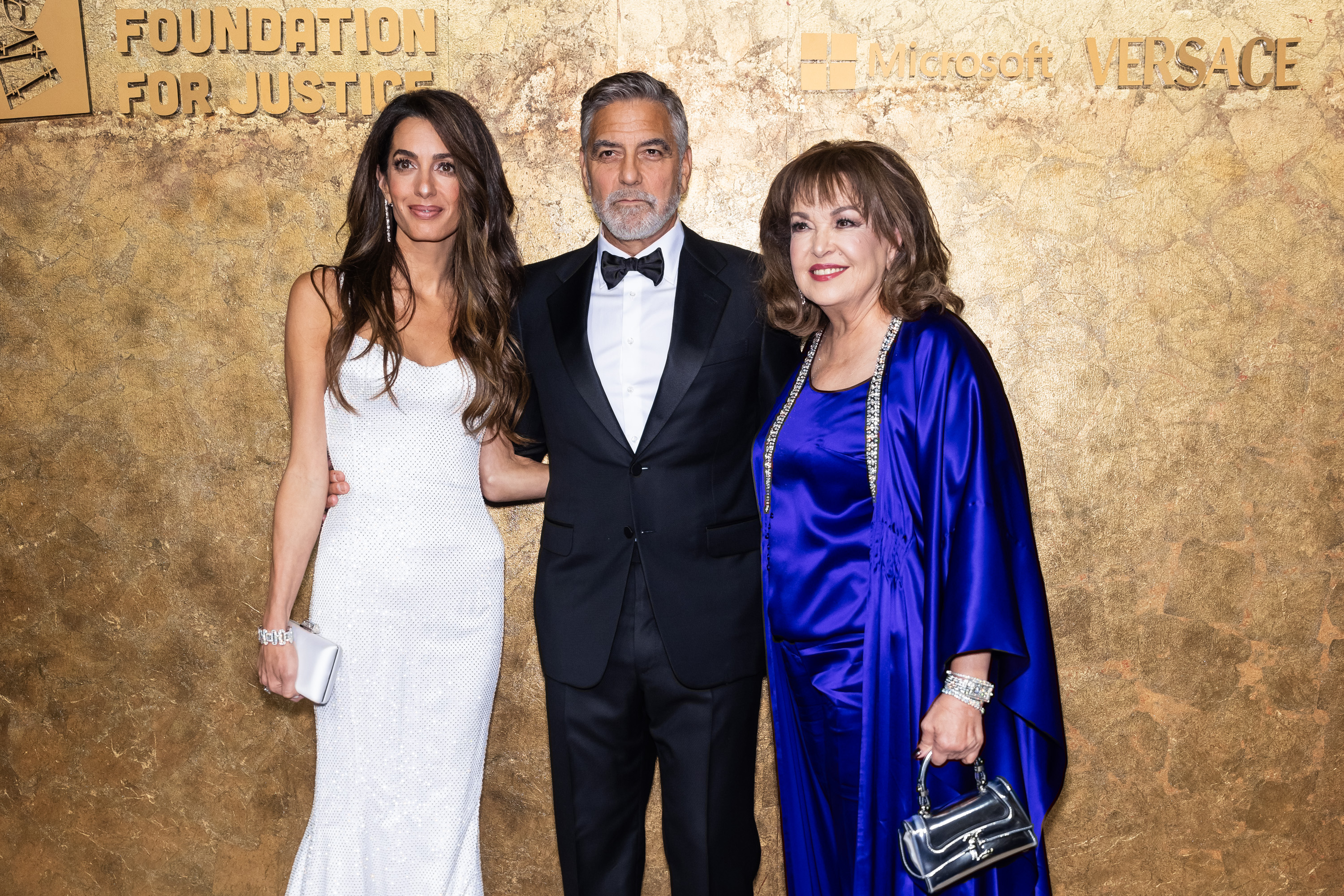 Amal Clooney, George Clooney, and Baria Alamuddin attend the Clooney Foundation for Justice's "The Albies" at the New York Public Library in New York City, on September 28, 2023 | Source: Getty Images