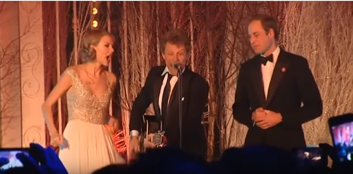 Prince William, Taylor Swift and Bon Jovi sing Livin' On a Prayer at the Winter Whiets Gala charity ball at Kensington Palace  many years ago| Photo: Youtube /  The Royal Family Channel