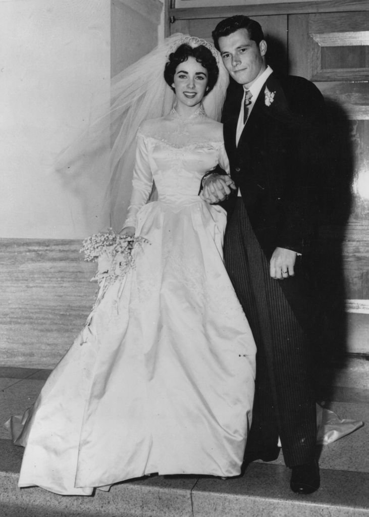  Elizabeth Taylor and hotelier Conrad Hilton after their wedding in Hollywood | Getty Images