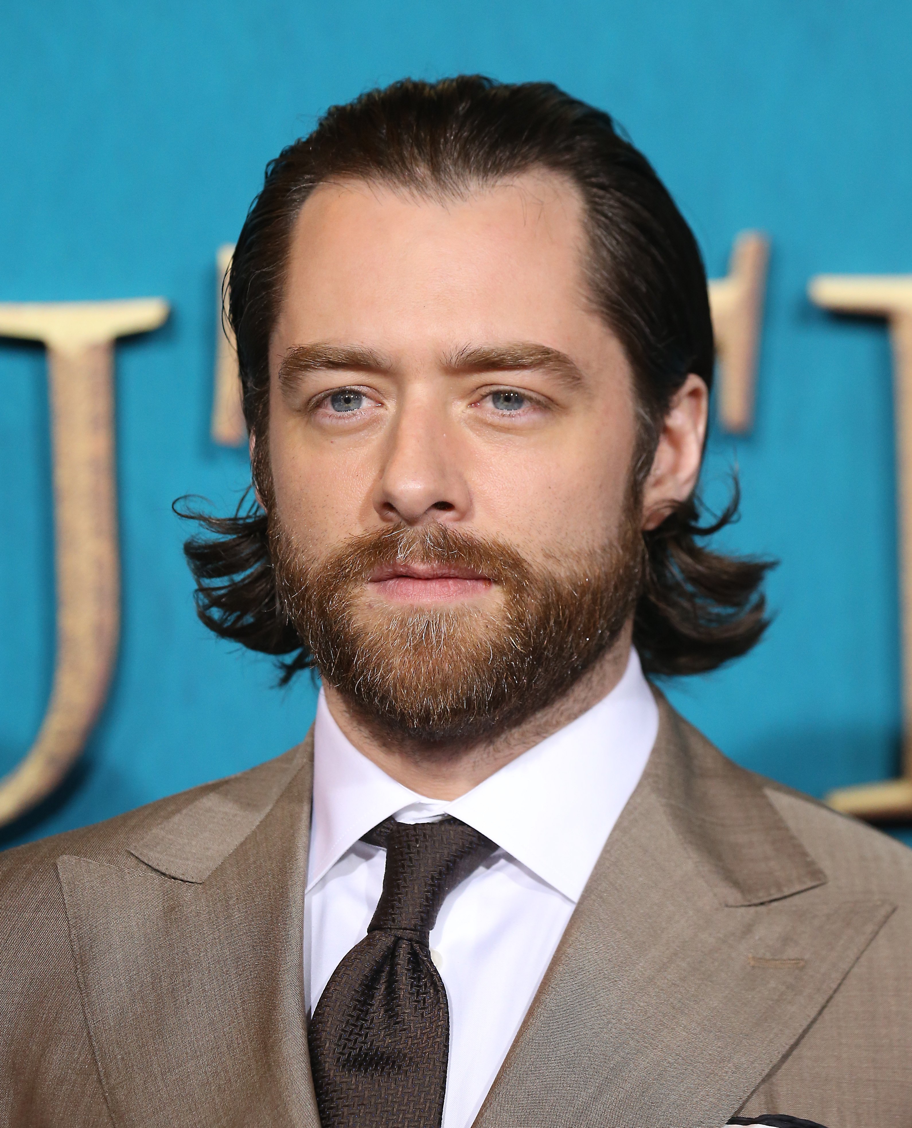 Richard Rankin attends the Los Angeles Premiere of Starz's "Outlander" Season 5 held at Hollywood Palladium in Los Angeles, California on February 13, 2020 | Source: Getty Images