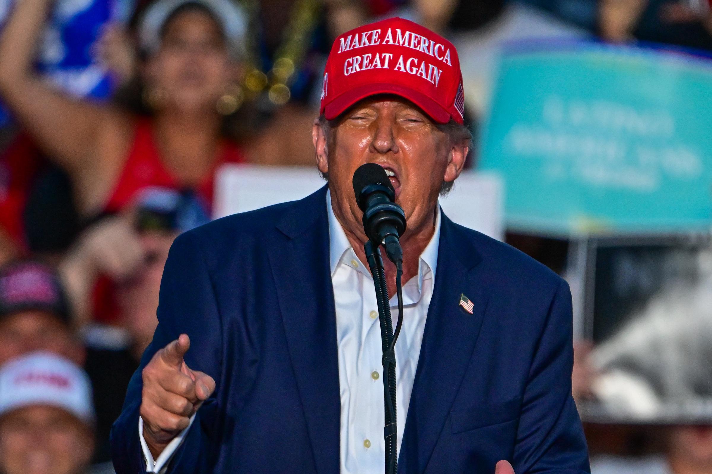 Donald Trump gestures as he speaks during a rally in Doral, Florida, on July 9, 2024 | Source: Getty Images