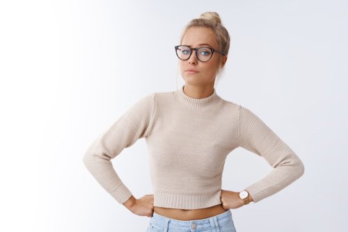 An unimpressed woman. | Source: Shutterstock. An unimpressed woman. | Source: Shutterstock.