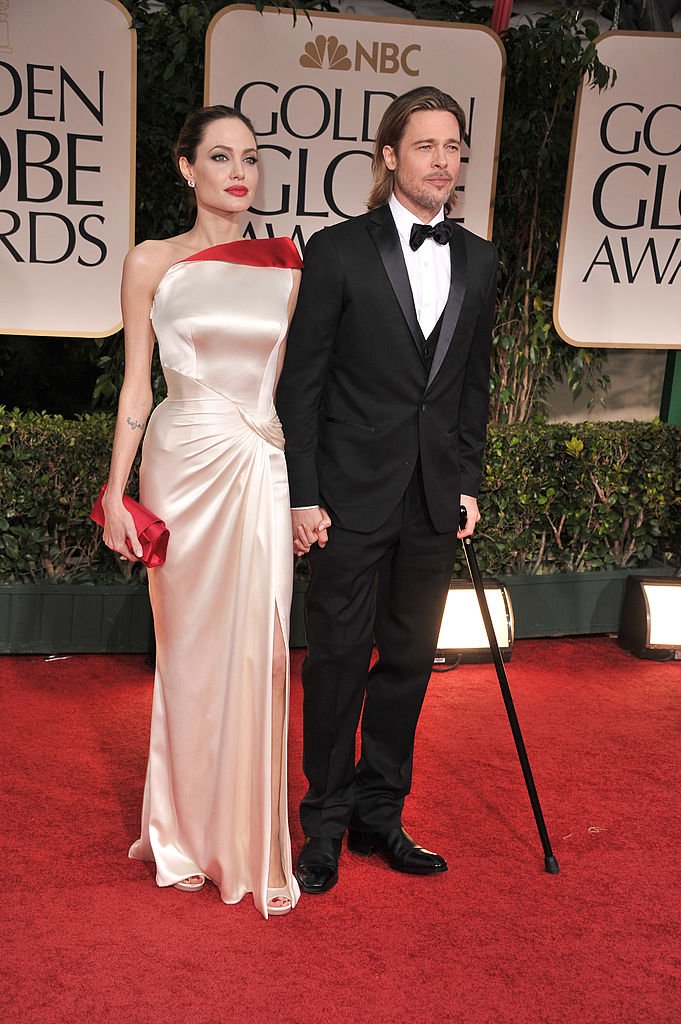 Angelina Jolie and Brad Pitt arrive at the 69th Annual Golden Globe Awards at The Beverly Hilton hotel on January 15, 2012 | Photo: Getty Images
