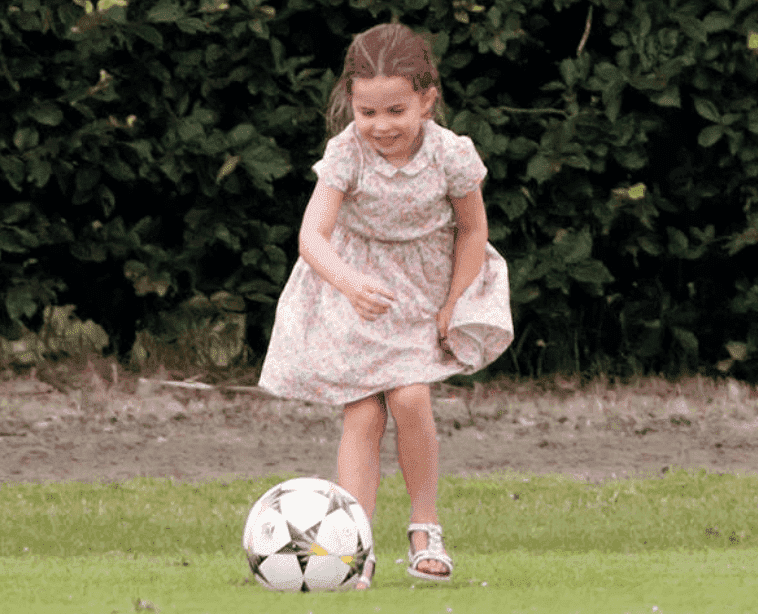 Prince George and Princess Charlotte play together on side-lines during The King Power Royal Charity Polo Day, at Billingbear Polo Club, on July 10, 2019, in Wokingham, England | Source: Getty Images (Photo by Samir Hussein/WireImage)