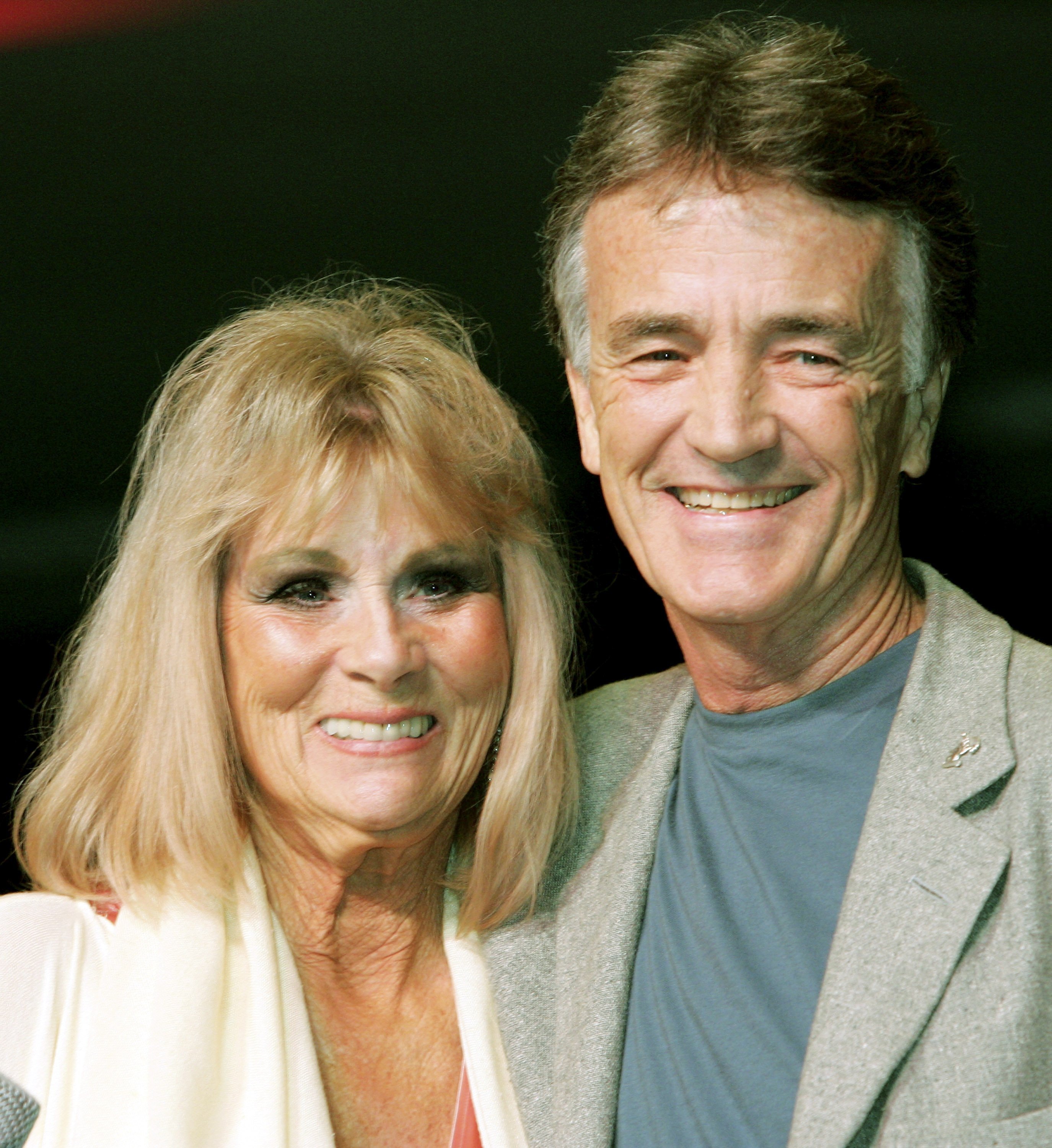 Grace Lee Whitney, who played Janice Rand in the original "Star Trek" television series and films, and actor Robert Walker Jr, who played the character Charlie Evans pose at the Star Trek convention at the Las Vegas Hilton August 11, 2005, in Las Vegas, Nevada | Photo: Ethan Miller/Getty Images