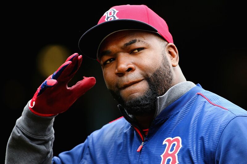 David Ortiz salutes the camera in full Red Sox gear | Source: Getty Images/GlobalImagesUkraine