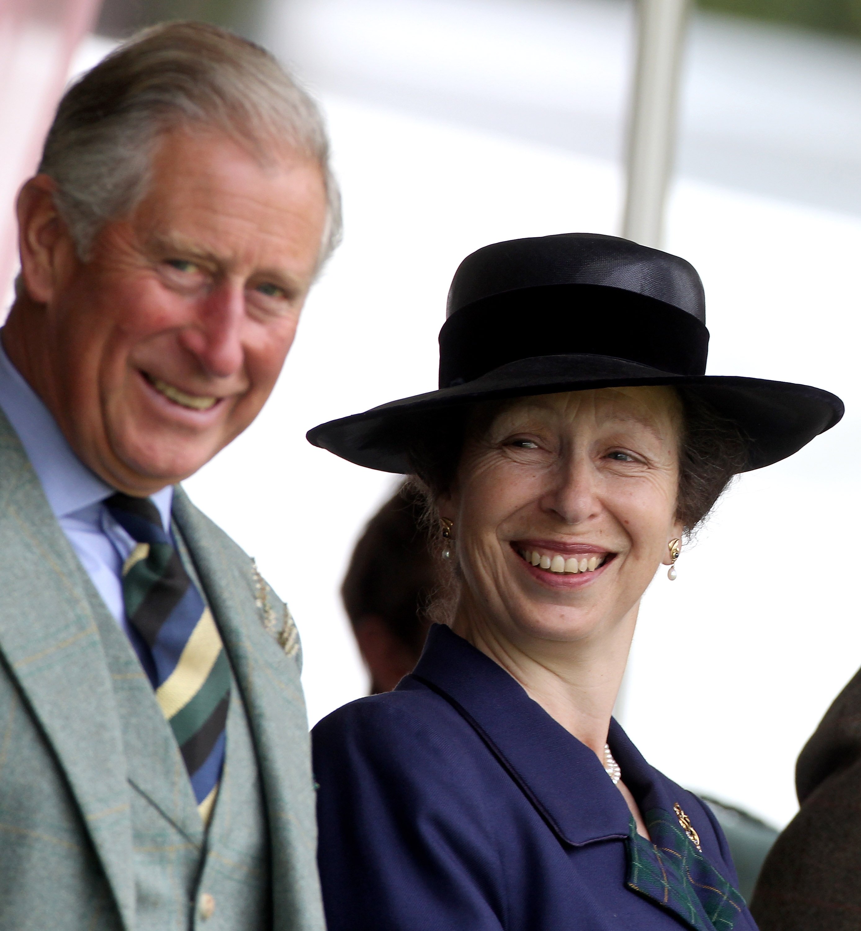 Prince Charles, Prince of Wales and Princess Anne, Princess Royal laugh in the royal box during the Braemar Highland Games at the Princess Royal and Duke of Fife Memorial Park on September 4, 2010 in Braemar, Scotland |  Source: Getty Images 