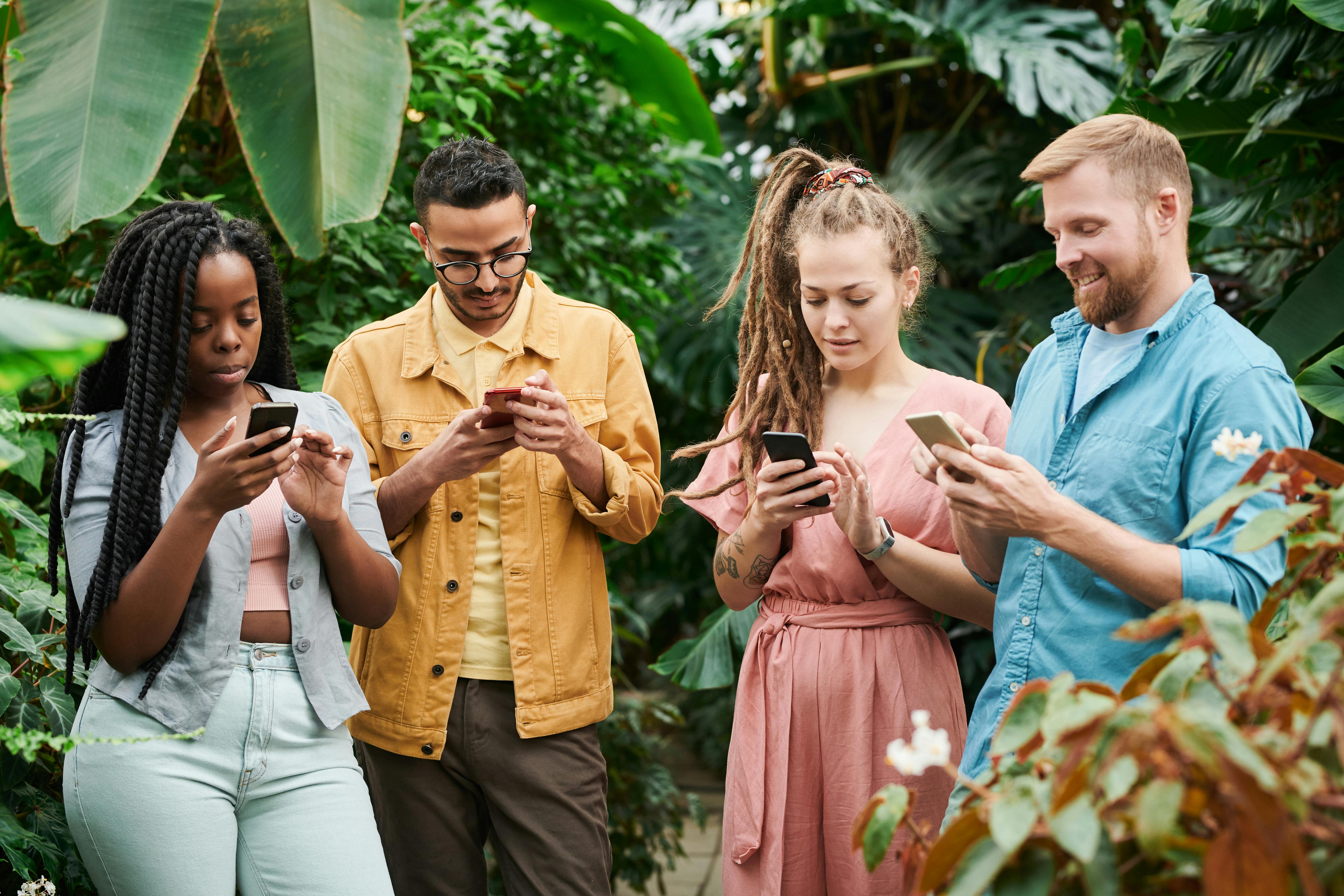 People messaging on their phones | Source: Pexels