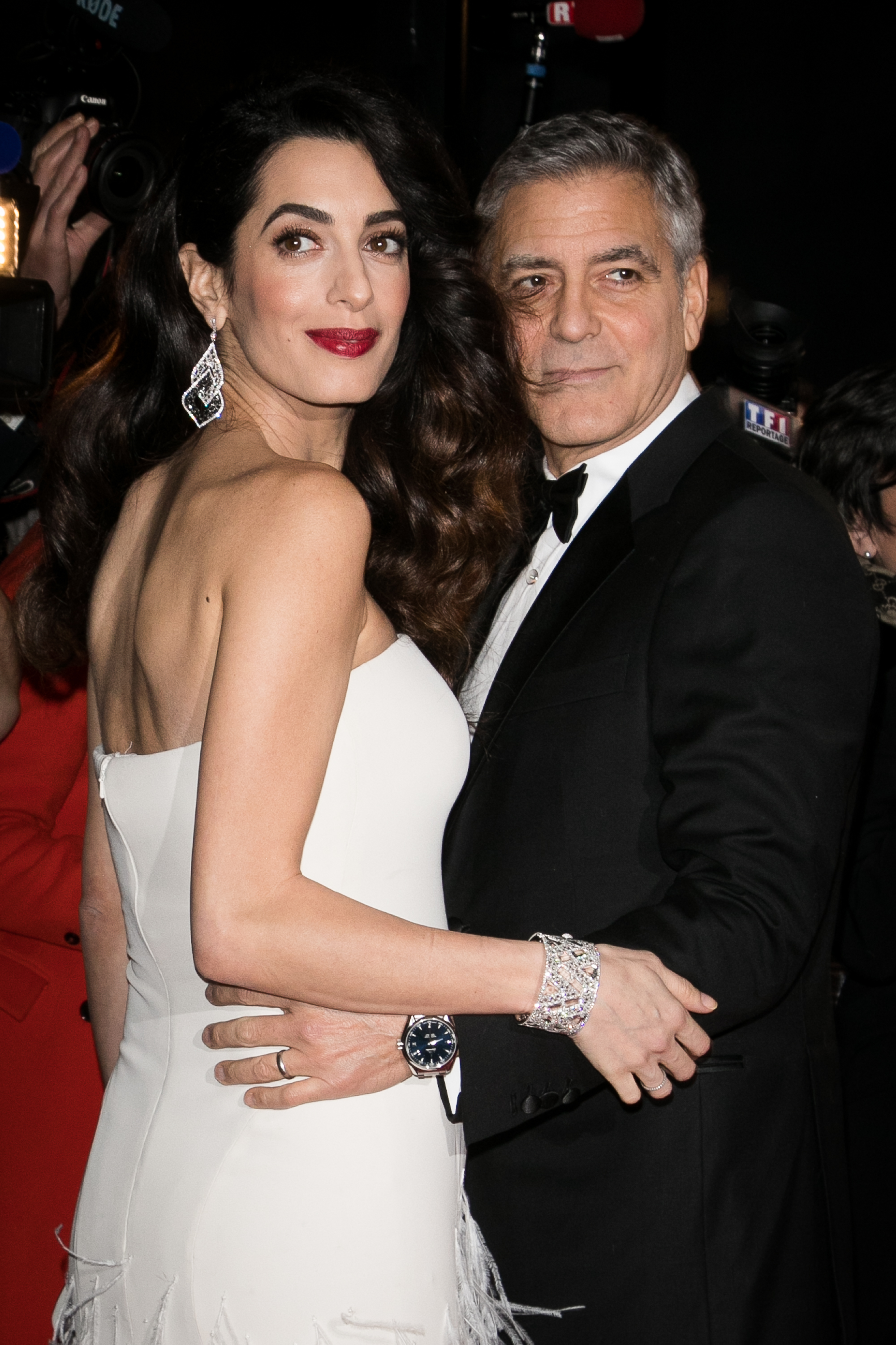 Amal Clooney and George Clooney in Paris, France on February 24, 2017 | Source: Getty Images