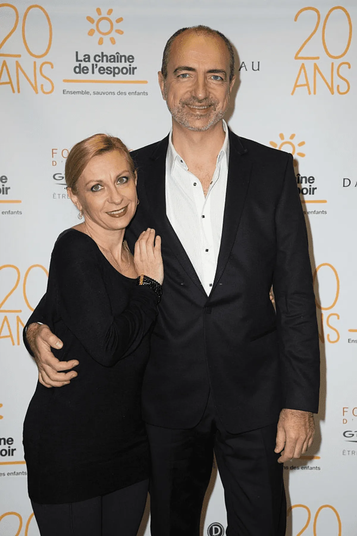 Natalie Dessay et Laurent Naouri assistent au 20ème anniversaire de la "Chaîne de l'Espoir", le 11 décembre, à Paris. | Photo : Getty Images
