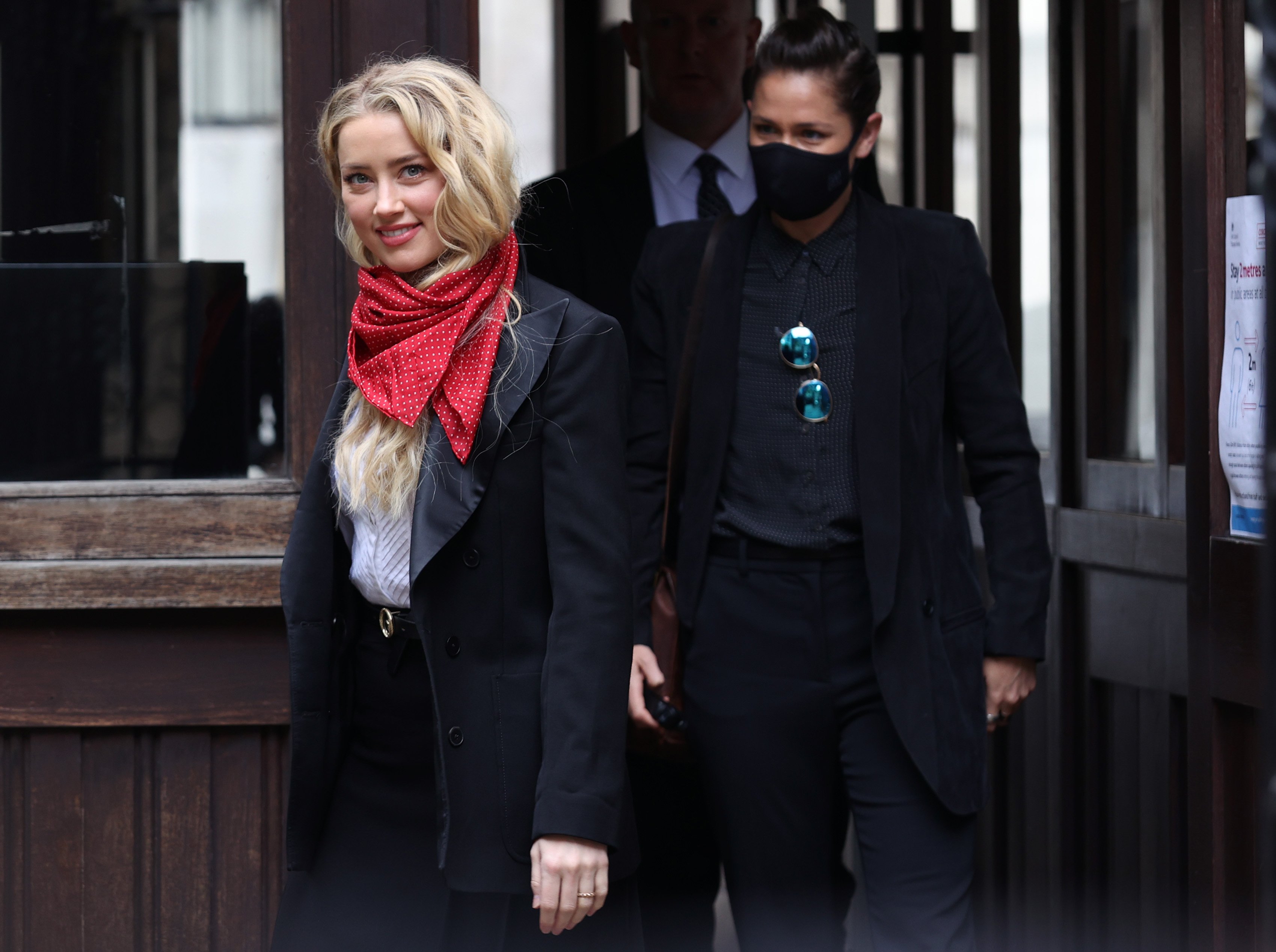 Bianca Butti and ex-girlfriend, Amber Heard, arrive at the High Court in London for Johnny Depp's libel case against the publishers of The Sun. | Source: Getty Images
