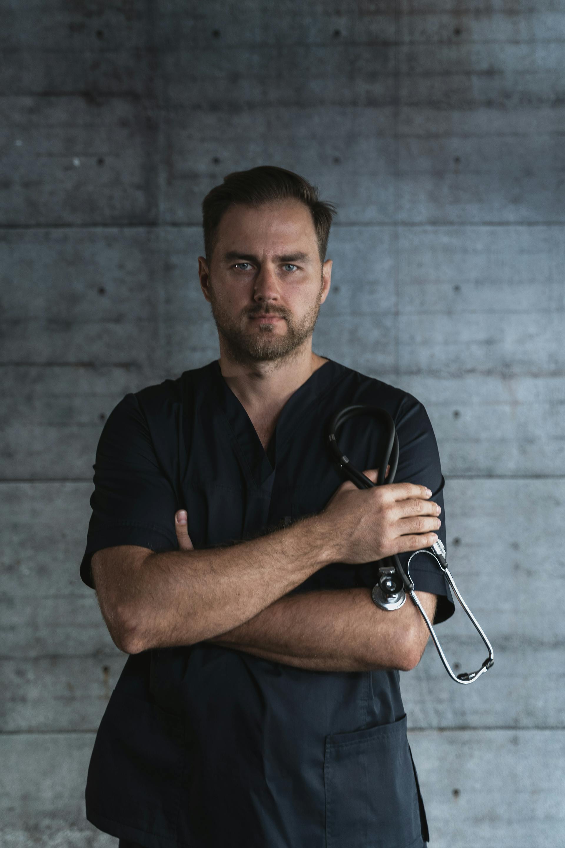 A male doctor with a serious facial expression | Source: Pexels