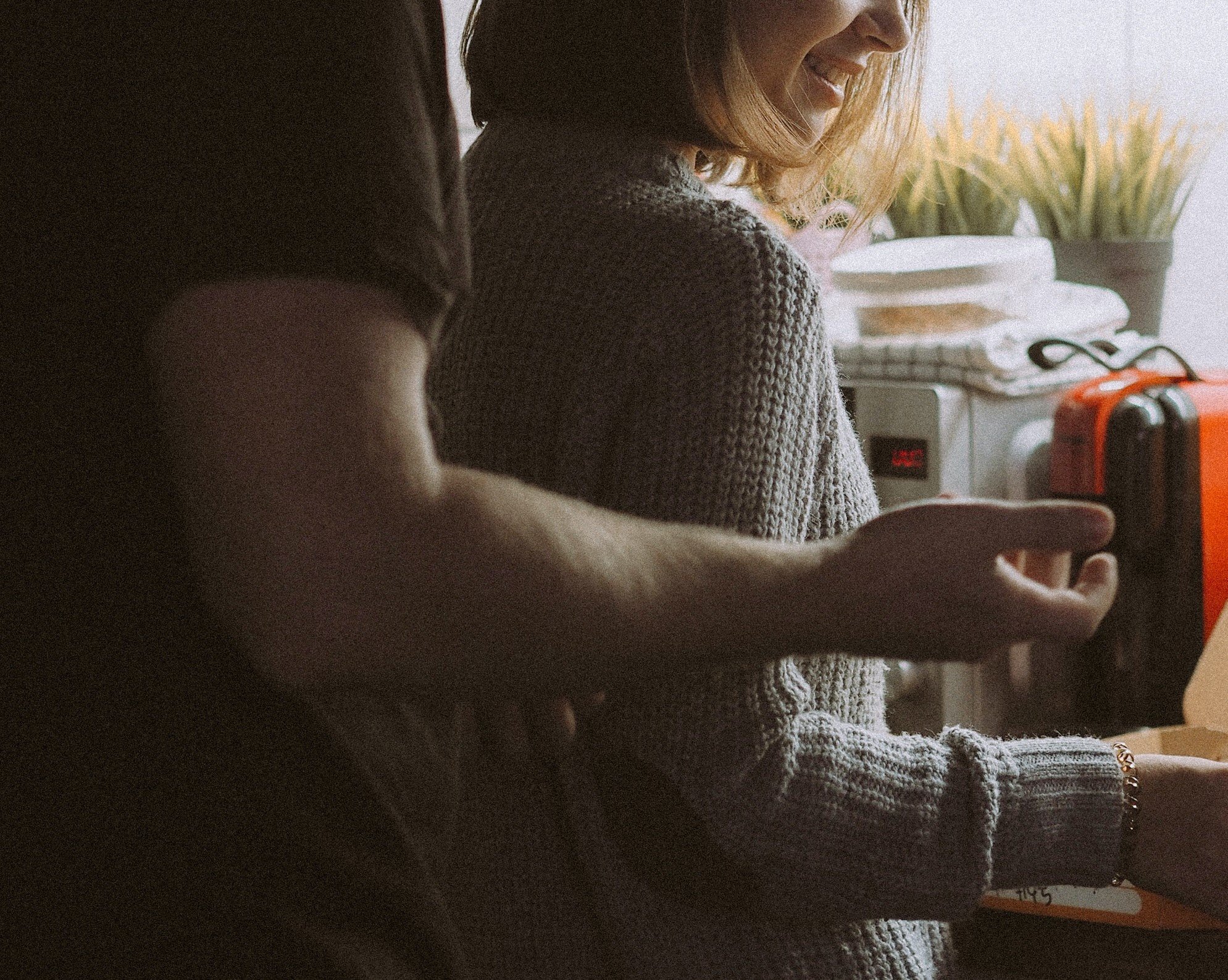 OP was shocked when he spotted the guy slapping Stacy's bottom in the kitchen. | Source: Pexels