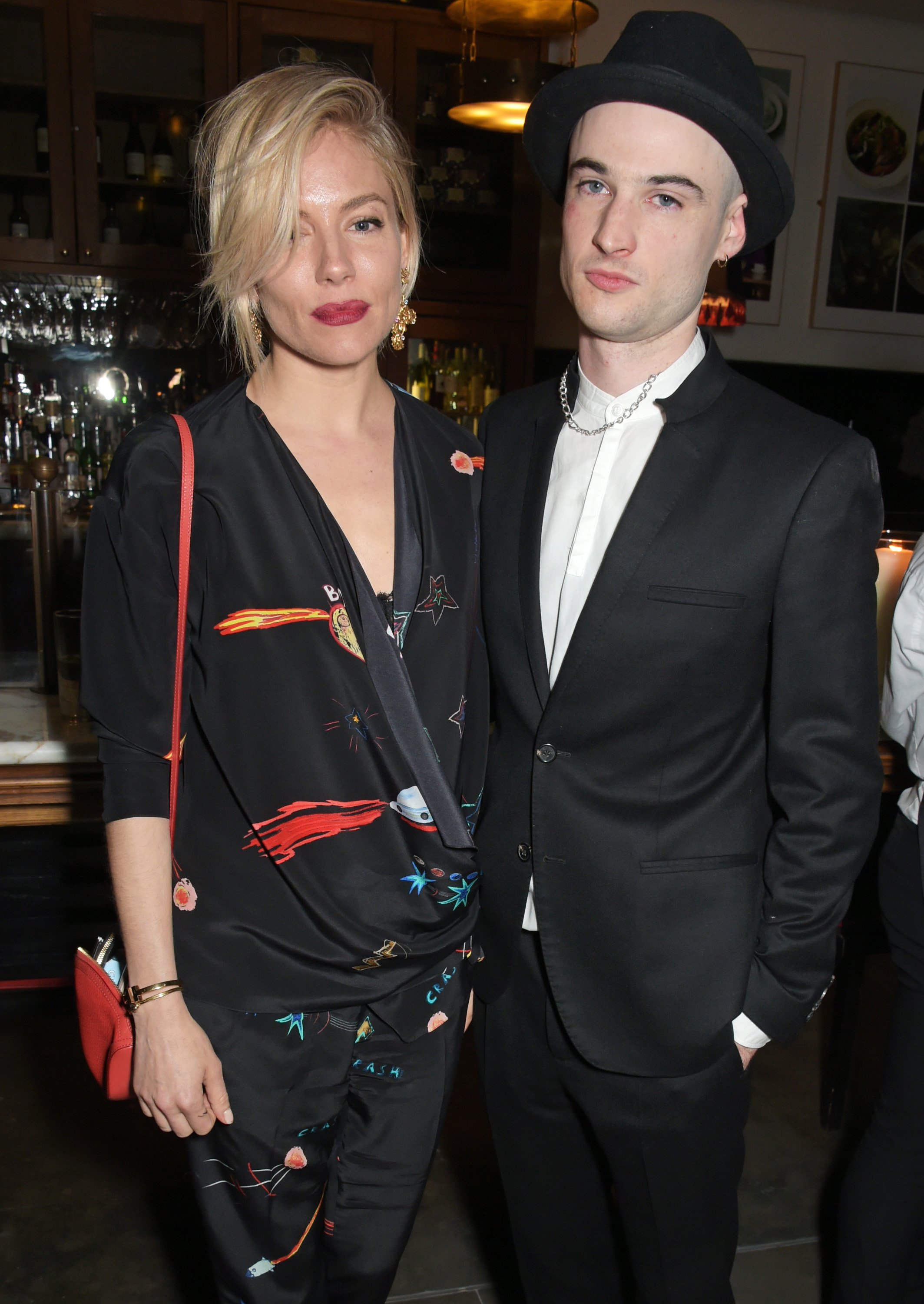 Sienna Miller and Tom Sturridge attend an after-party at The National Café on April 27, 2015, in London, England. | Source: Getty Images