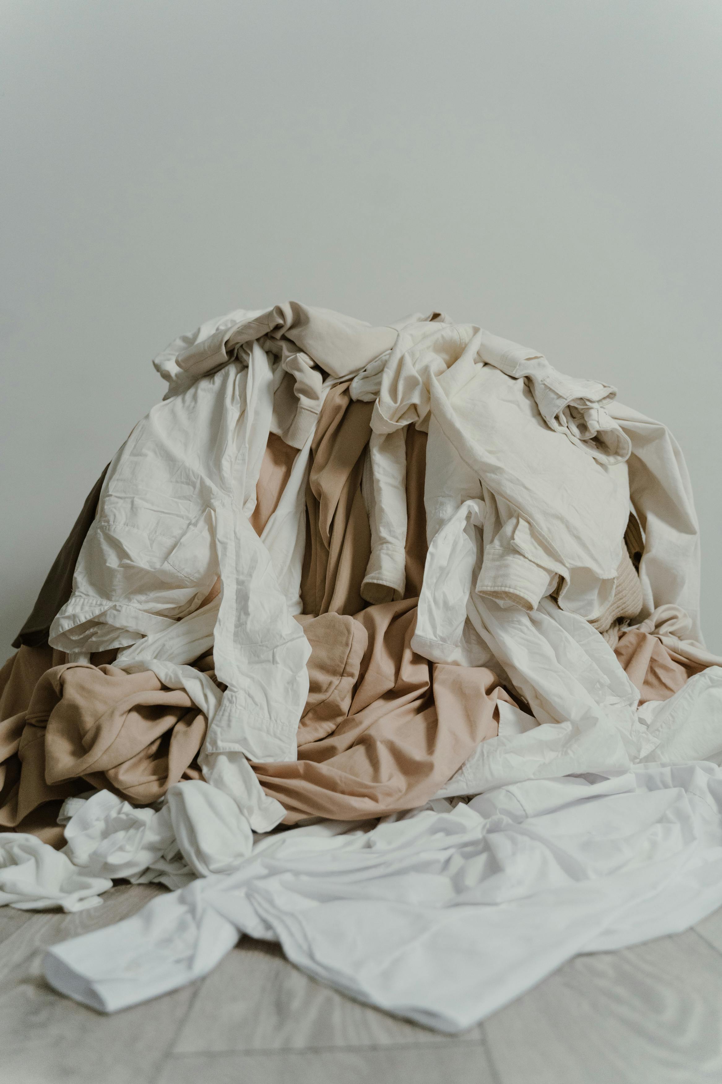 Heap of clothes and fabric | Source: Pexels