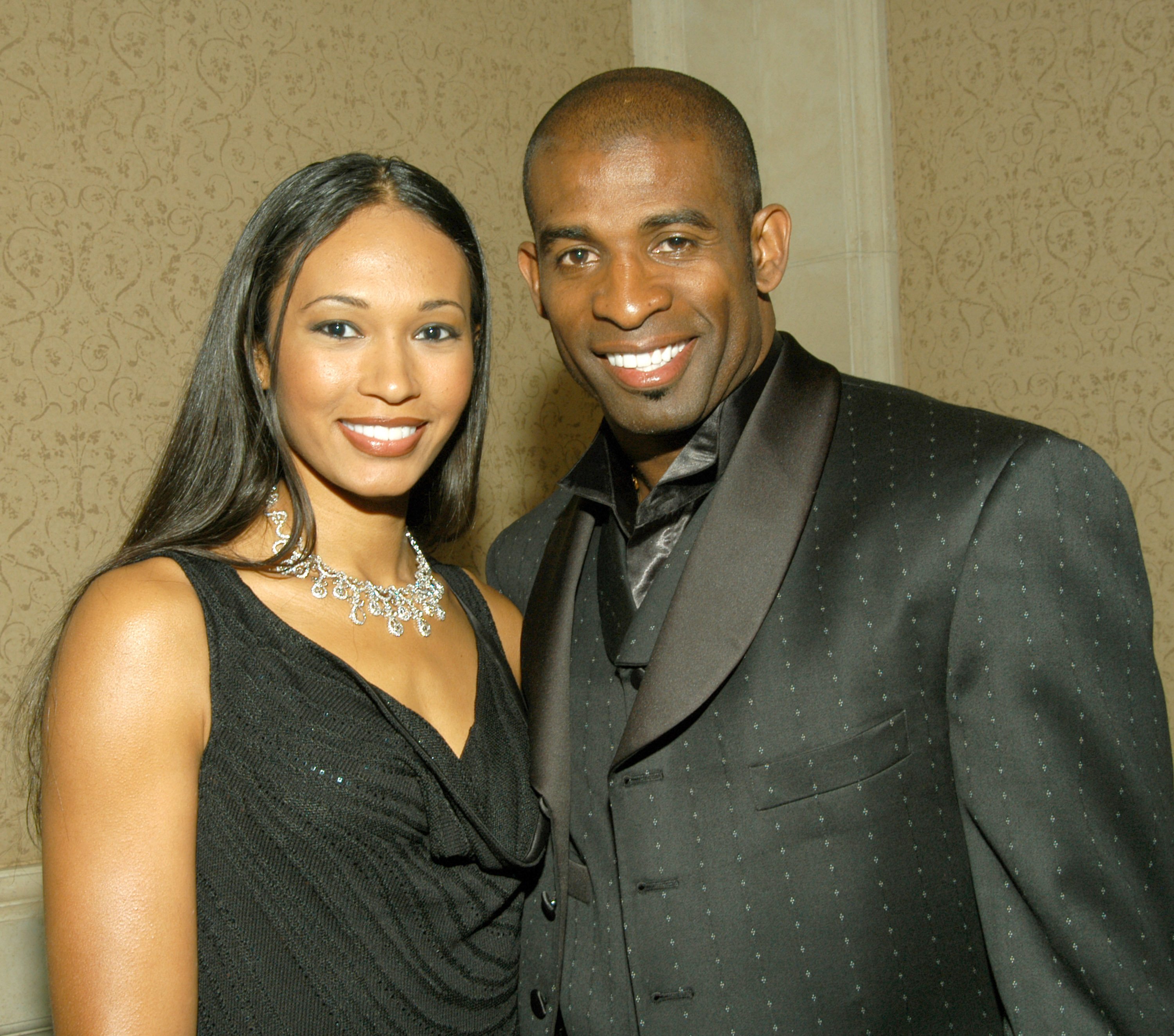 Deion Sanders and Pilar Sanders at the Rick Weiss Humanitarian Awards Gala in California on May 3, 2003 | Source: Getty Images
