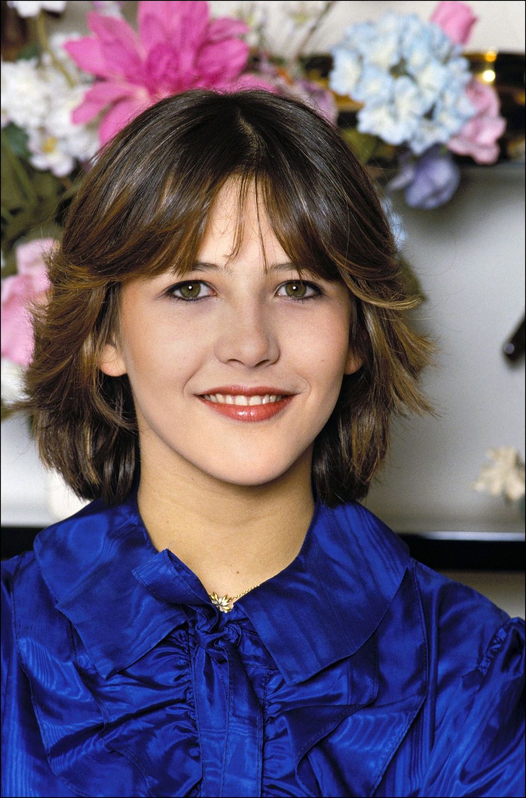 Sophie Marceau sur le tournage du film "La Boum 2" le 22 juillet 1982, France. | Photo : Getty Images