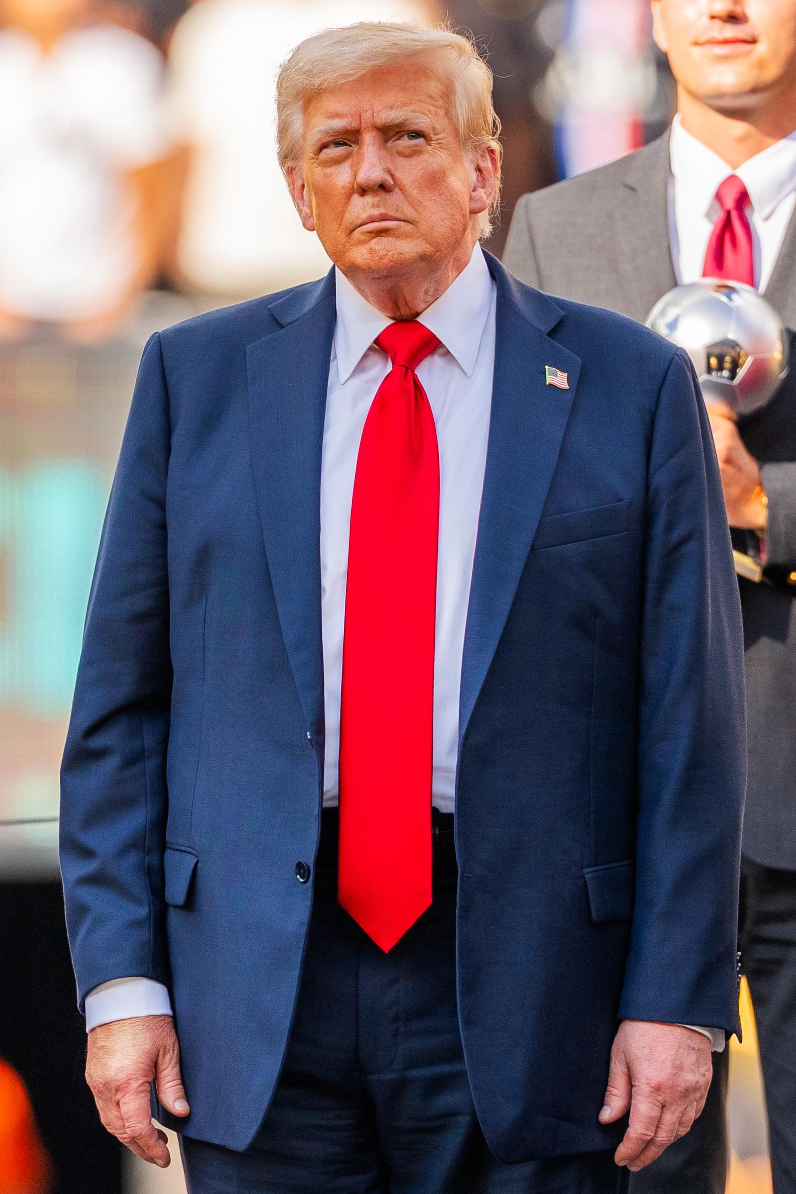 President Donald Trump stands ready to present awards during the FIFA Club World Cup final match between Chelsea FC and Paris Saint-Germain at MetLife Stadium on July 13, 2025, in East Rutherford, New Jersey. | Source: Getty Images