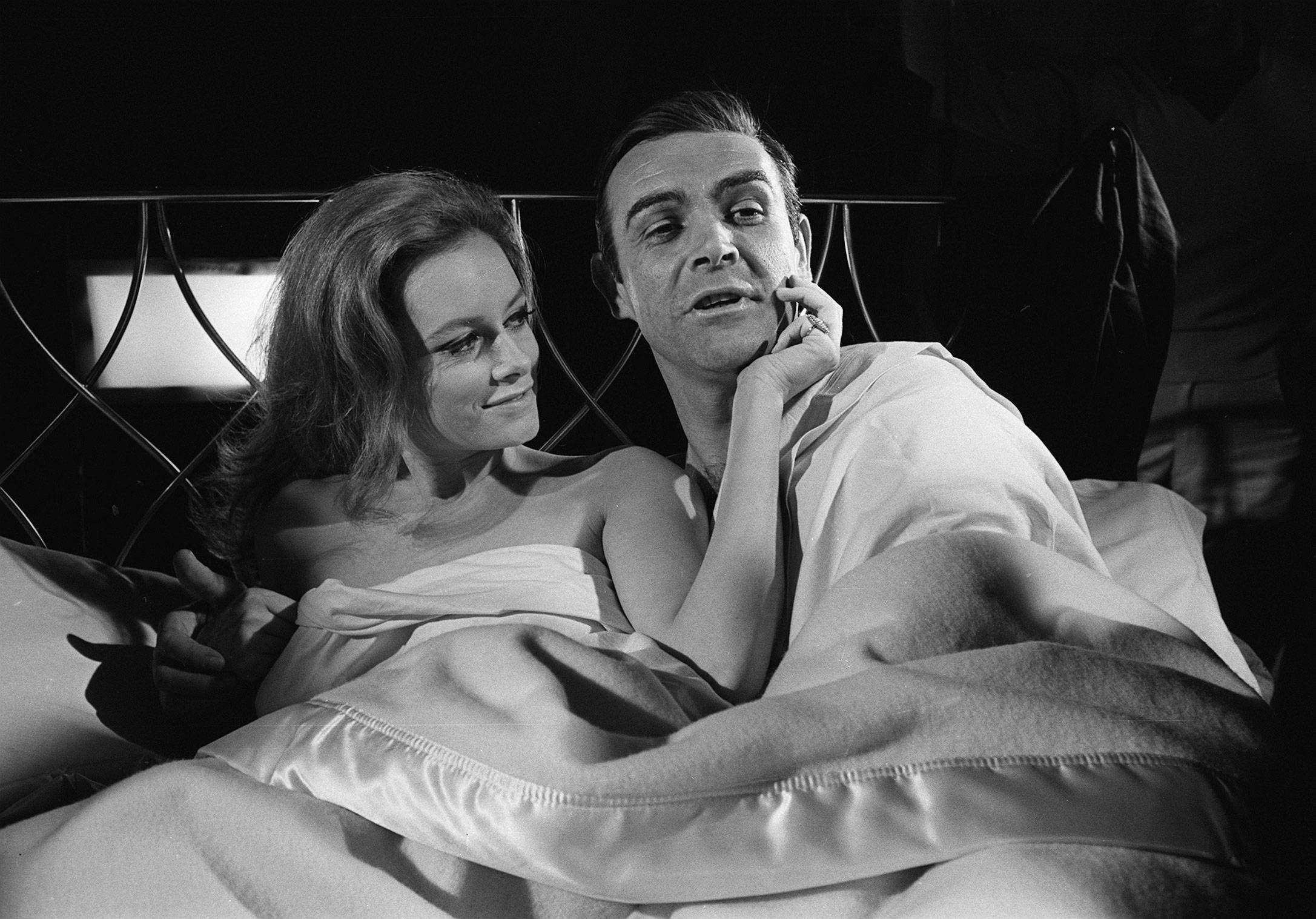Luciana Paluzzi and Sean Connery on the set of "Thunderball" at Pinewood Studios in March 1965. | Source: Getty Images