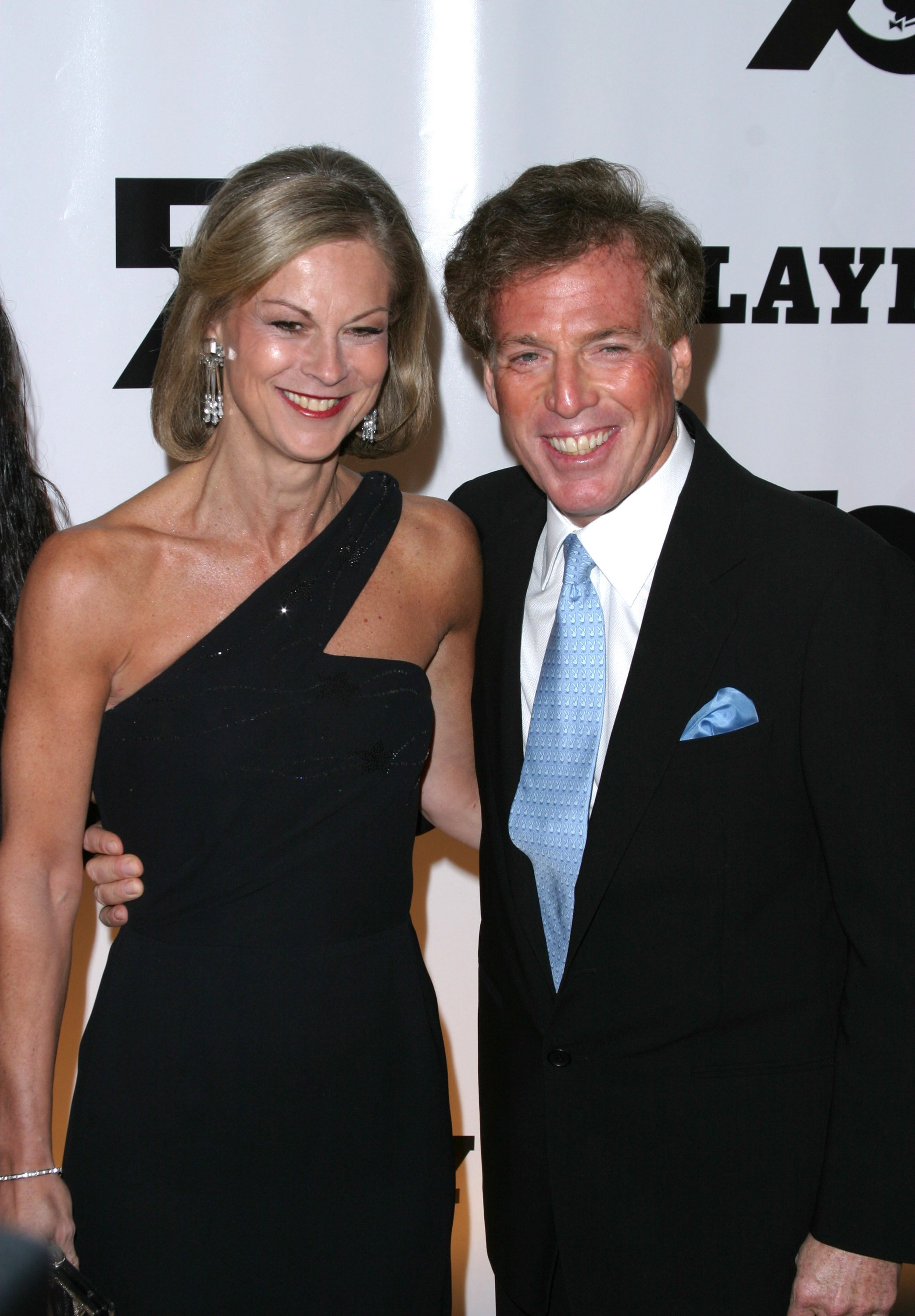 Christie Hefner and Bill Marovitz pose on the red carpet during Playboy's 50th Anniversary Celebration in New York City | Source: Getty Images