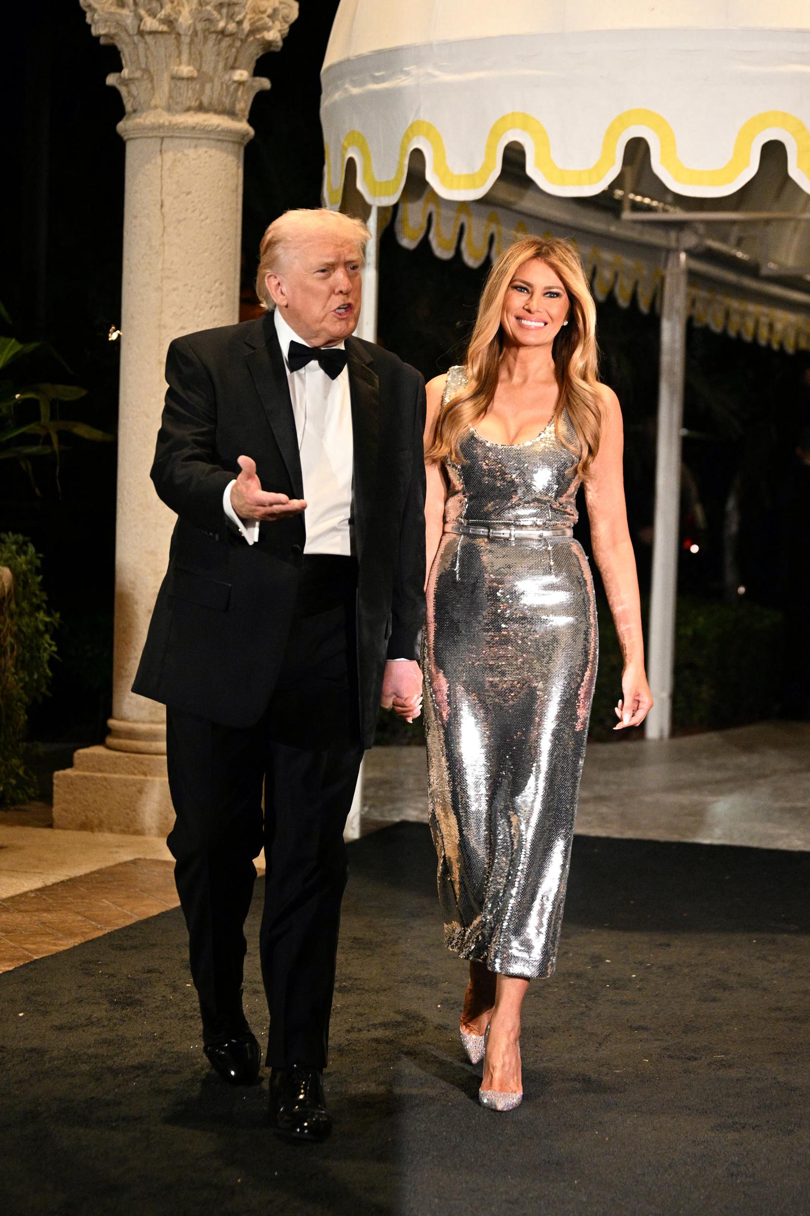 Donald Trump and Melania Trump arrive for a New Year’s Eve event at Mar-a-Lago on December 31, 2025, in Palm Beach, Florida | Source: Getty Images