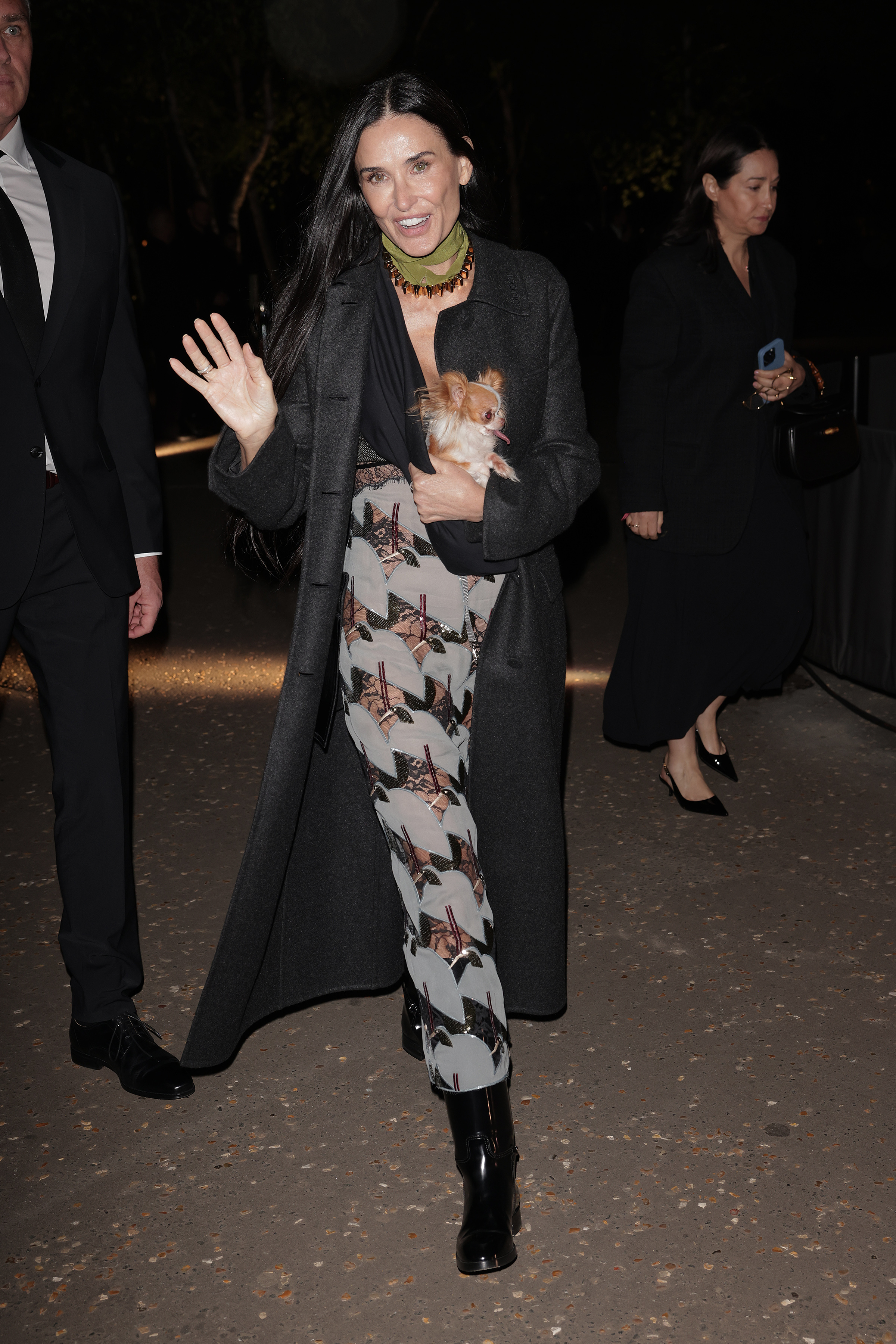 Demi Moore and her dog, Pilaf, at the Gucci Cruise 2025 Fashion Show on May 13, 2024, in London, England. | Source: Getty Images