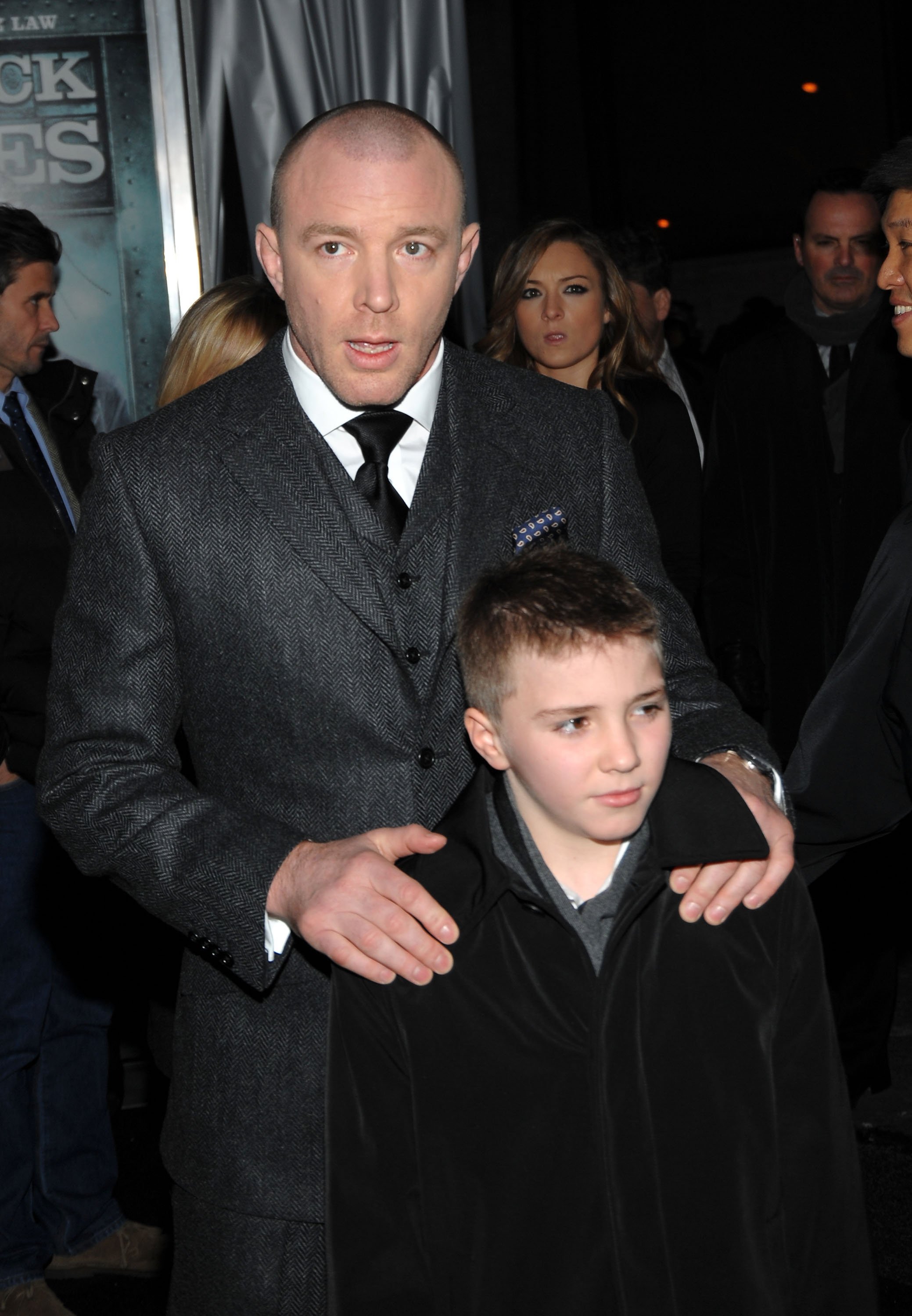 Rocco Ritchie and his father Guy Ritchie attend the premiere of "Sherlock Holmes" at the Lincoln Center on December 17, 2009 in New York City | Source: Getty Images