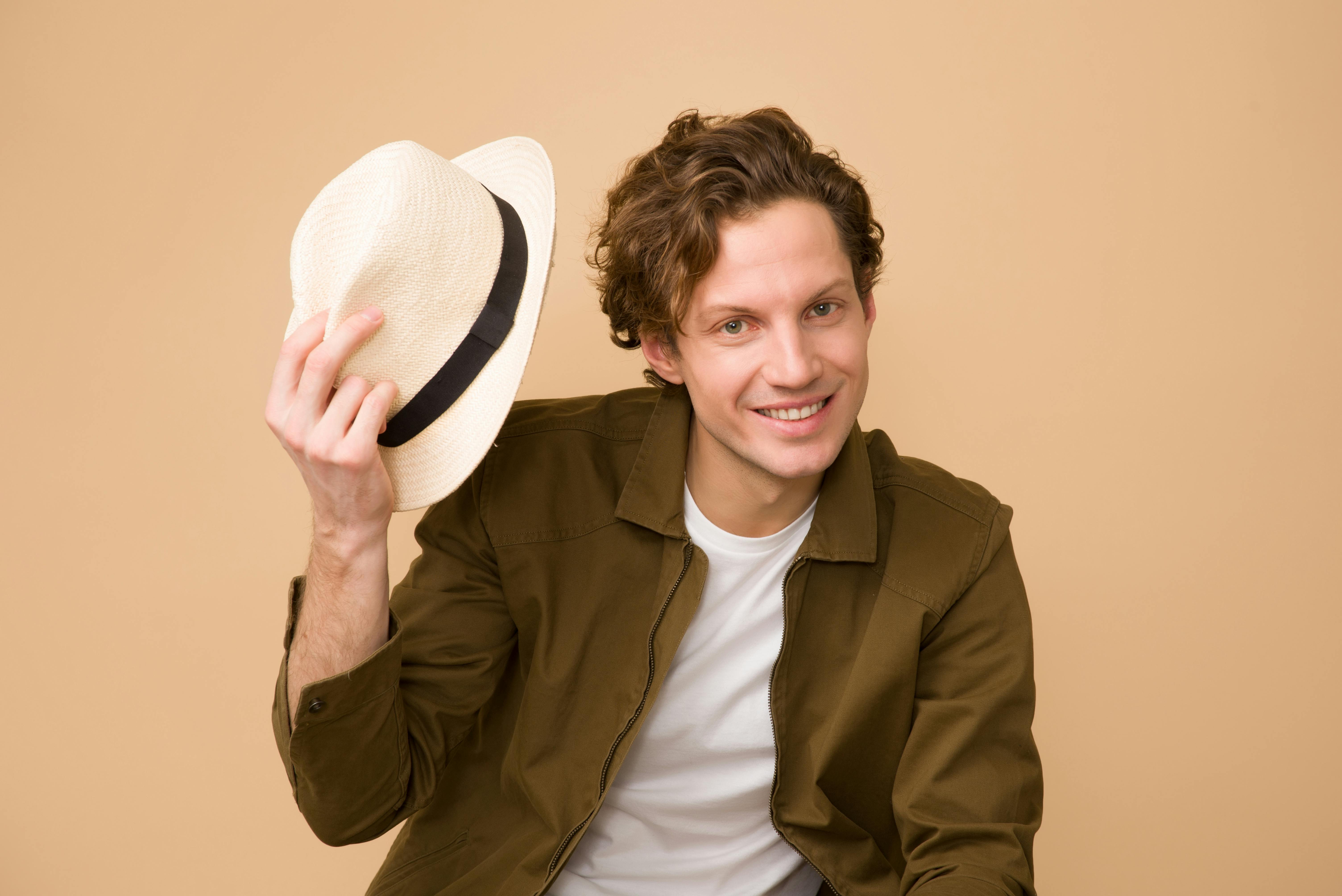 Happy young man with a hat | Source: Pexels