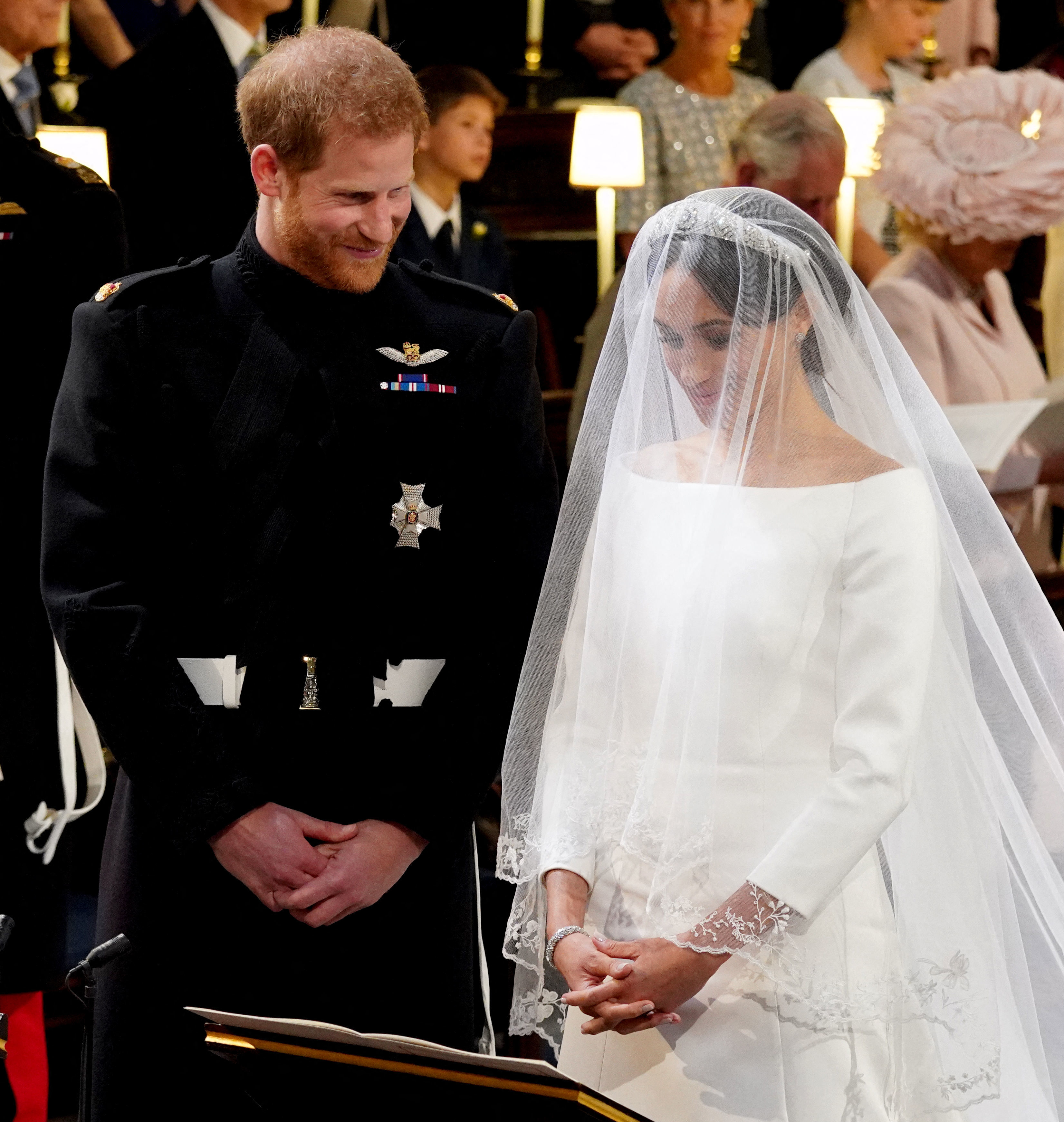 Prince Harry and Meghan Markle at the High Altar during their wedding at St. George's Chapel, Windsor Castle, on May 19, 2018  | Source: Getty Images