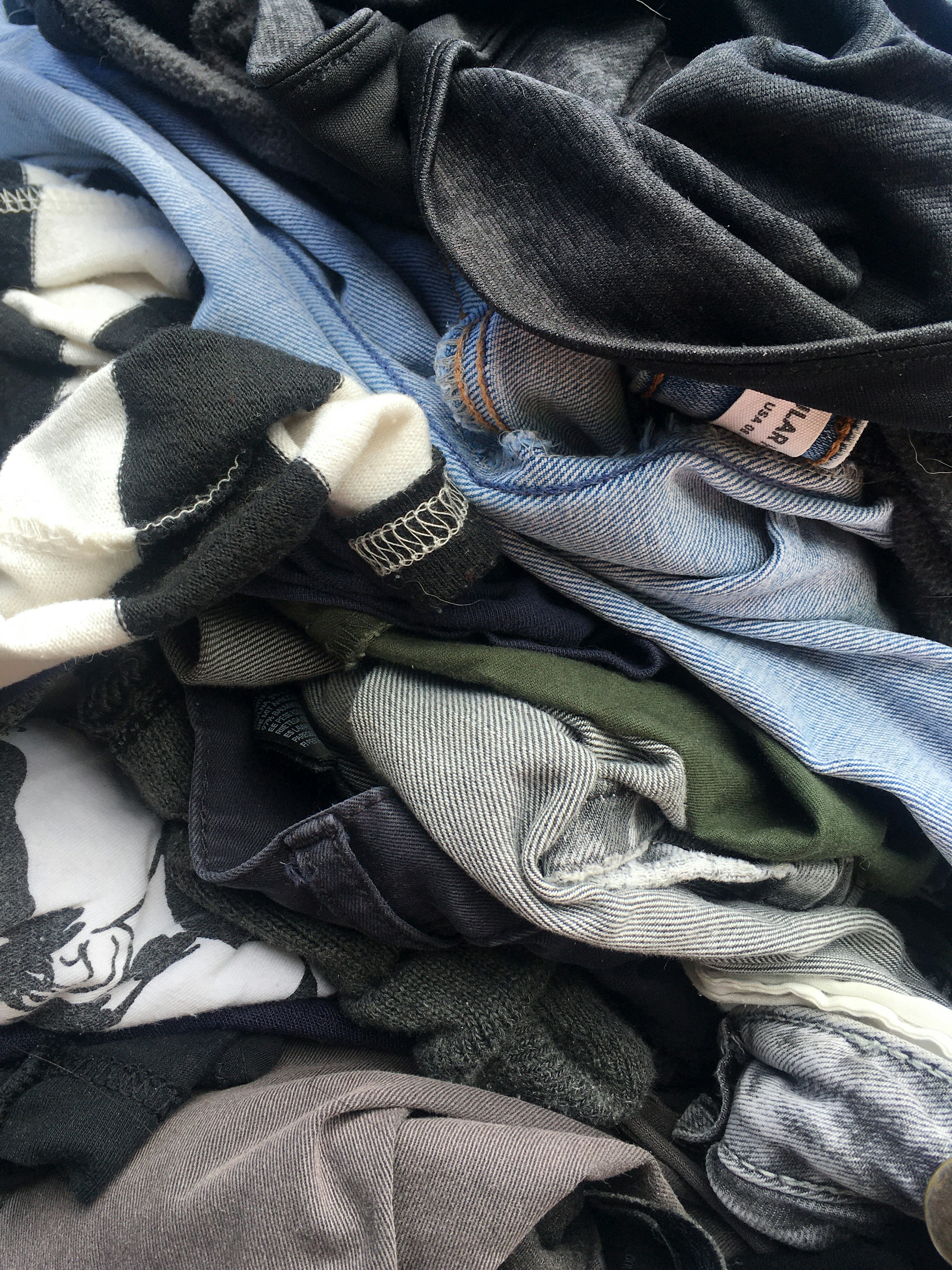 A pile of clothes | Source: Unsplash